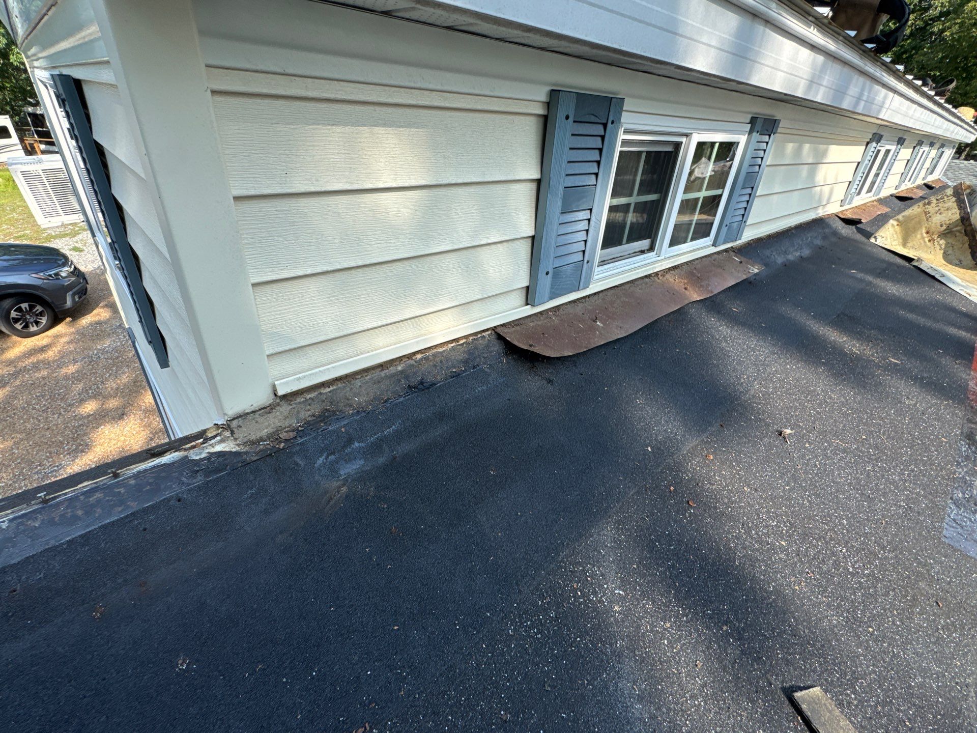 White Standing Seam Metal Roof Installation in Wake, VA by Cade Construction