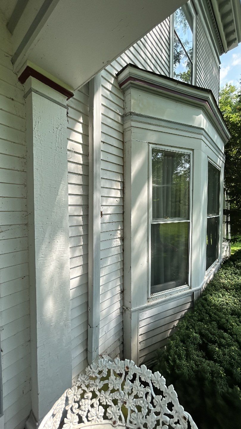 Housewashing  using Algaecide, soft wash soap by Northern Power Washing LLC.