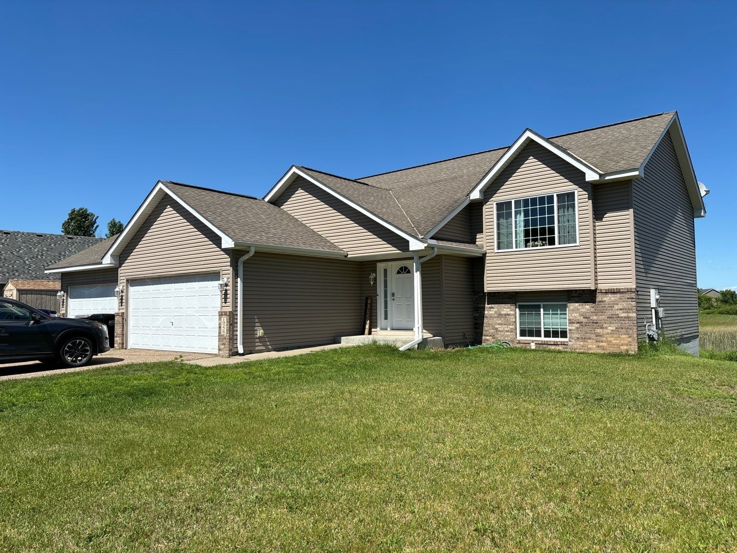 CertainTeed Landmark Roof, Mastic Siding & Edco Gutters | Insurance Approved | Big Lake, MN by First Impressions Exteriors