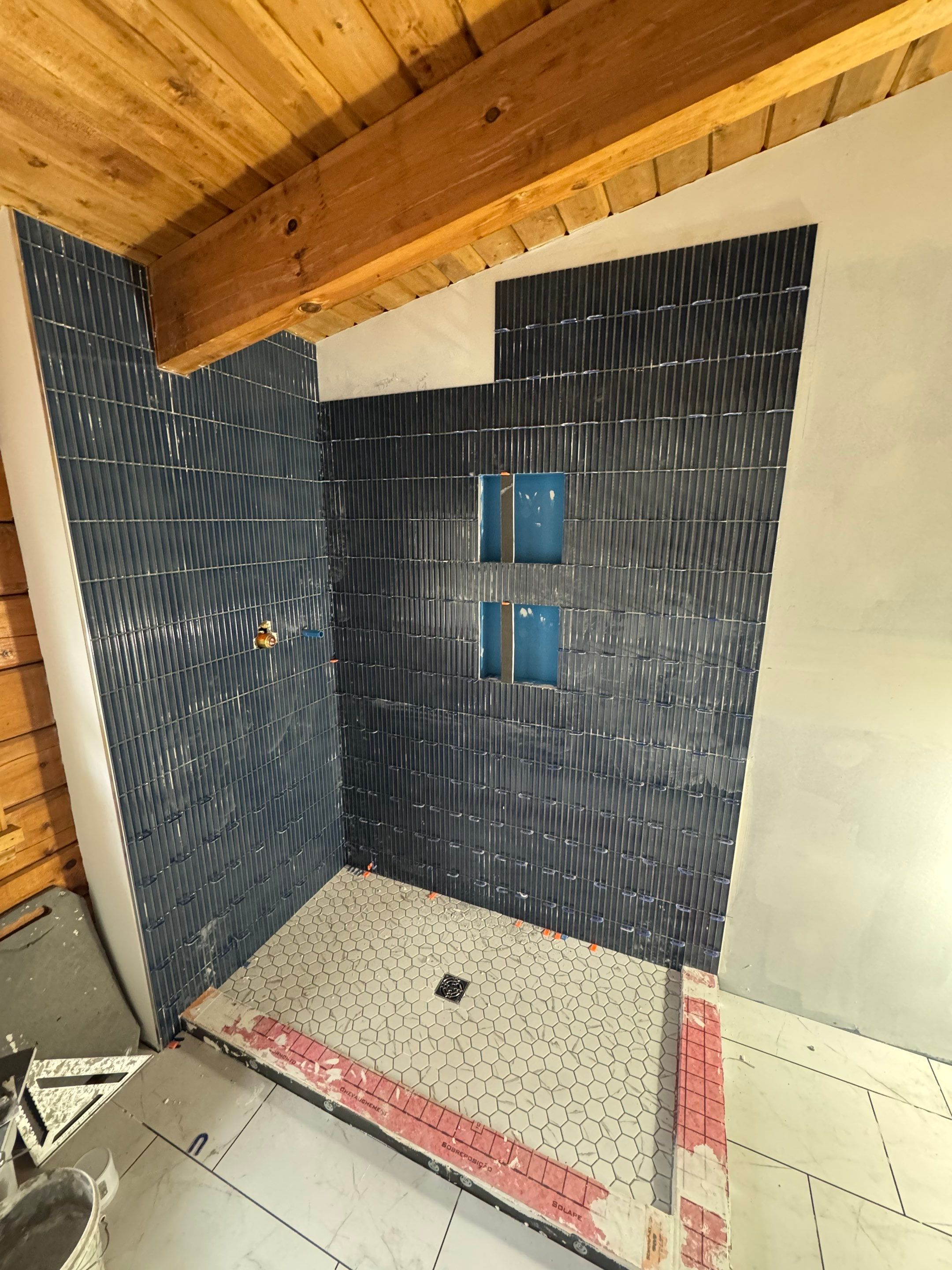 Brandt Double Bathroom Remodel by Integrity Tile and Home LLC