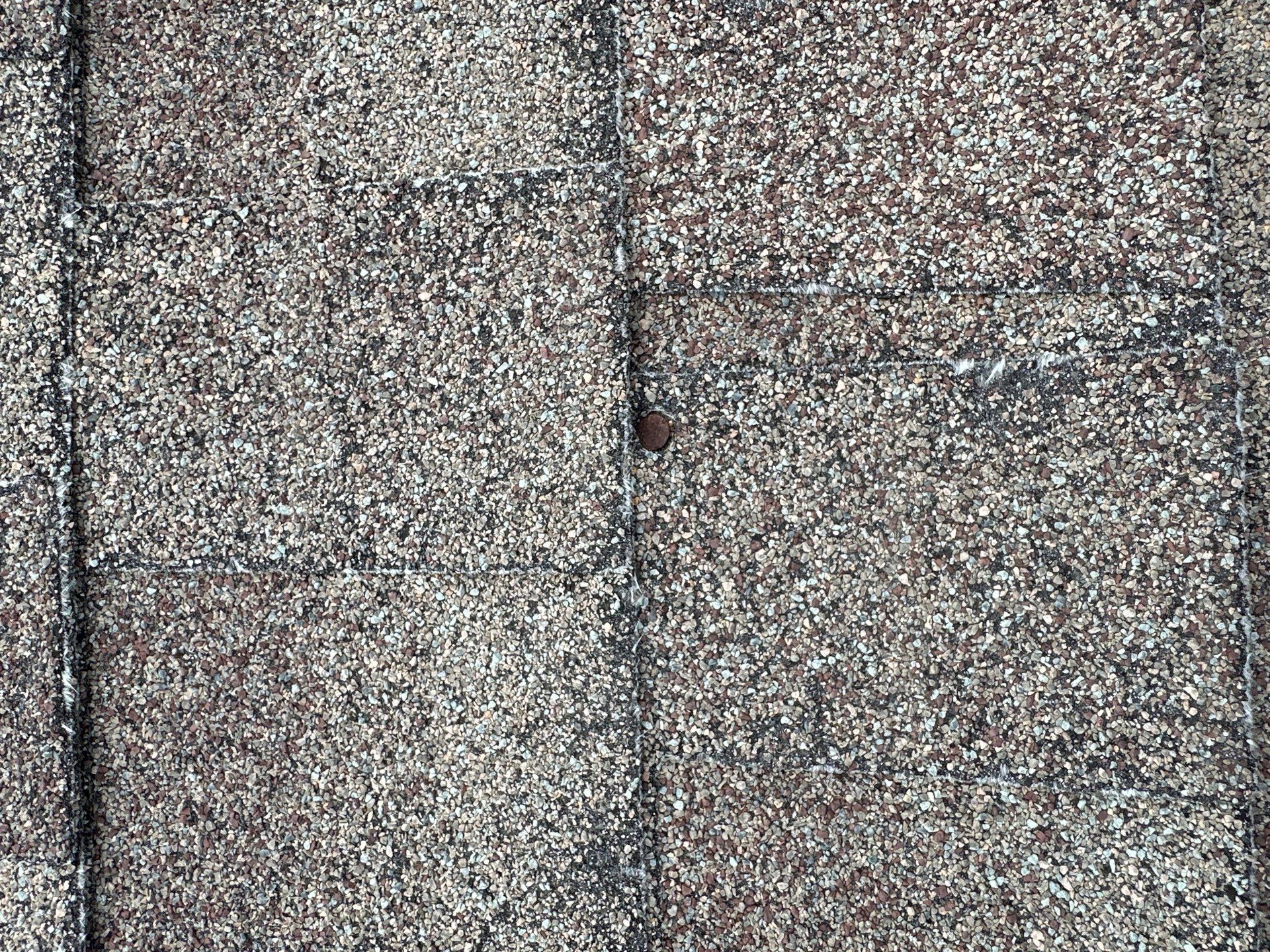 Roof Damage  by Zeus Exteriors