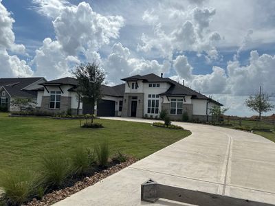 Waller Sophistication: Snowbound Color Stucco with Limestone Accents.