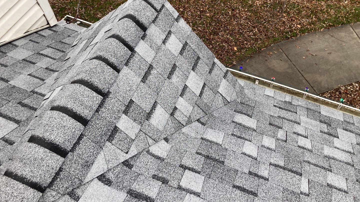 Two story farmhouse style roofing installation using Owens Corning Duration in the color Teak by ID Roofing LLC