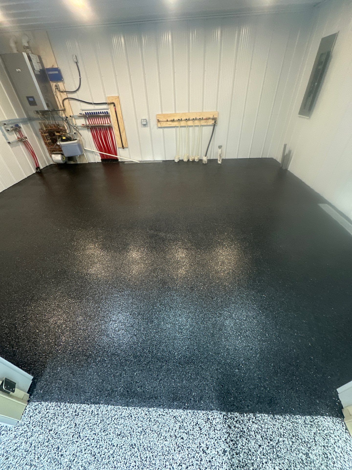 Barndominium Flake Coating using Polyaspartic by Revival Concrete Coatings