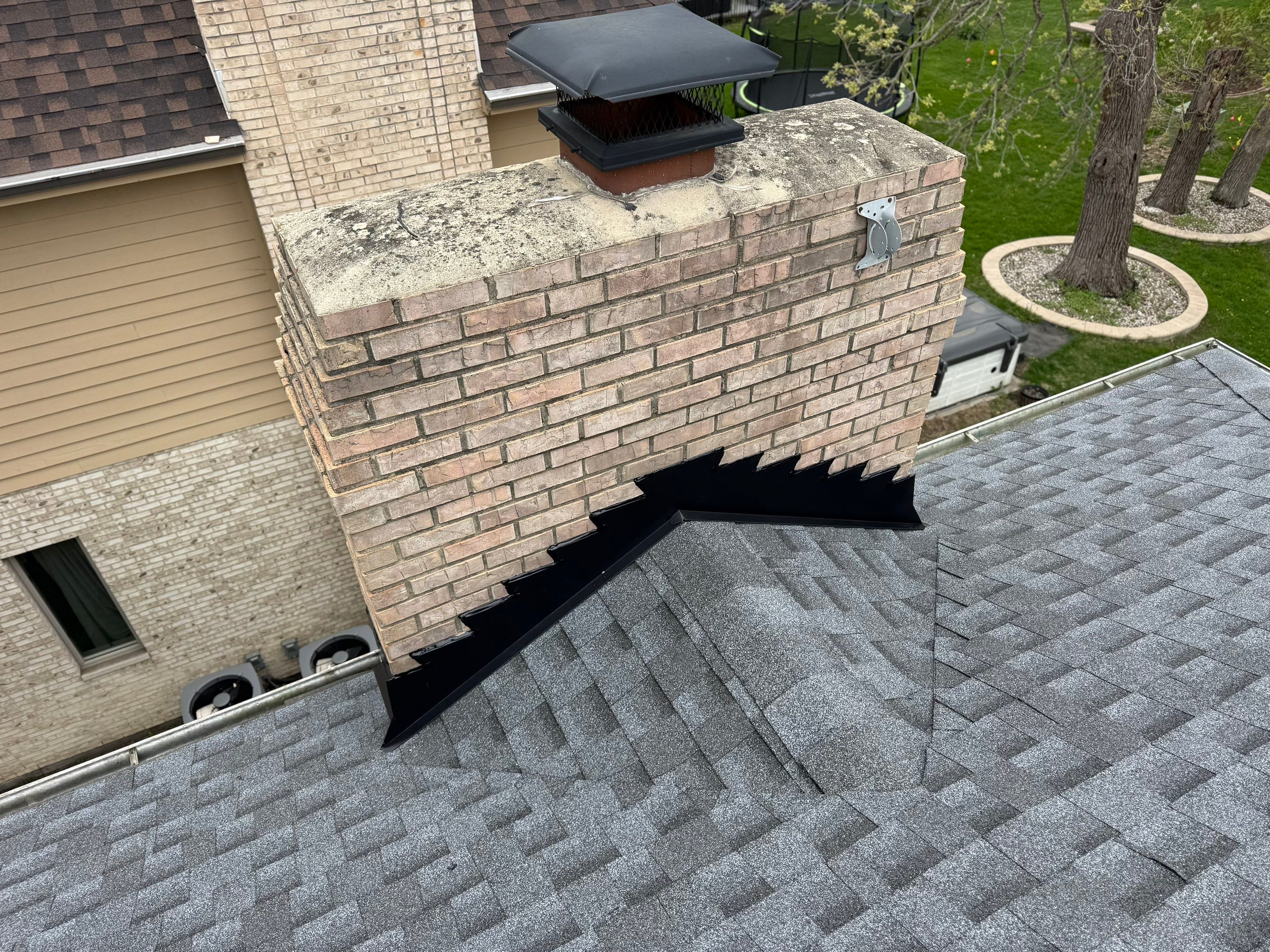Roof, gutters and chimney flashing by Optimal Home Improvement 