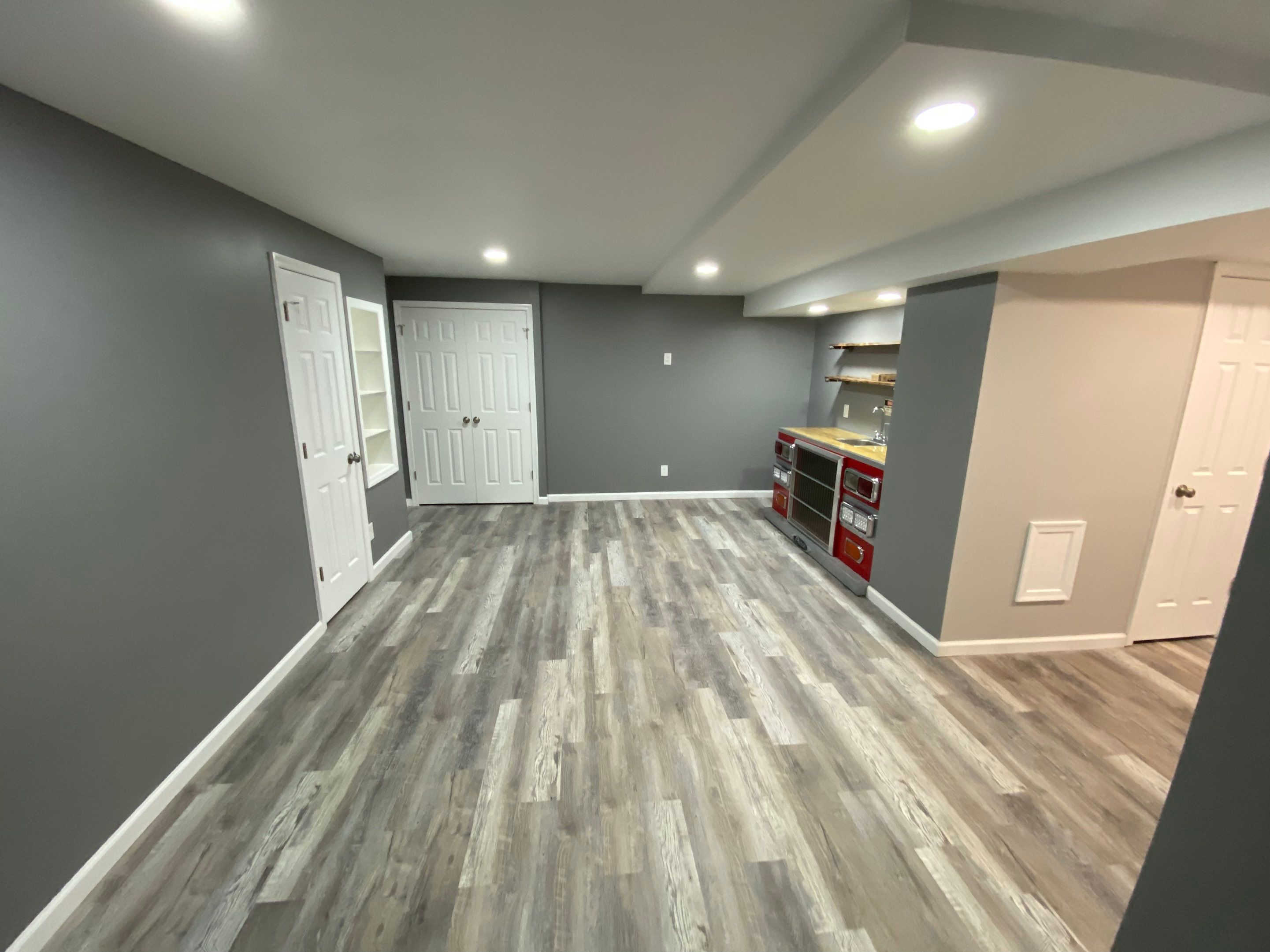 Complete Basement Buildout by The Smet Companies, LLC