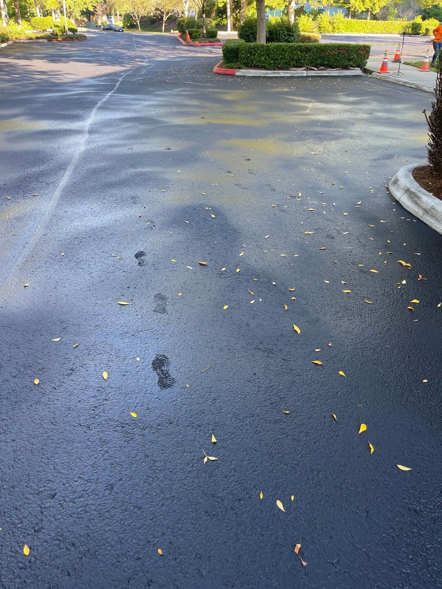 Kidder Matthews | Parking Lot Sealcoating & Striping with Concrete Curb & Patch Repairs  by Jireh Asphalt & Concrete Inc 