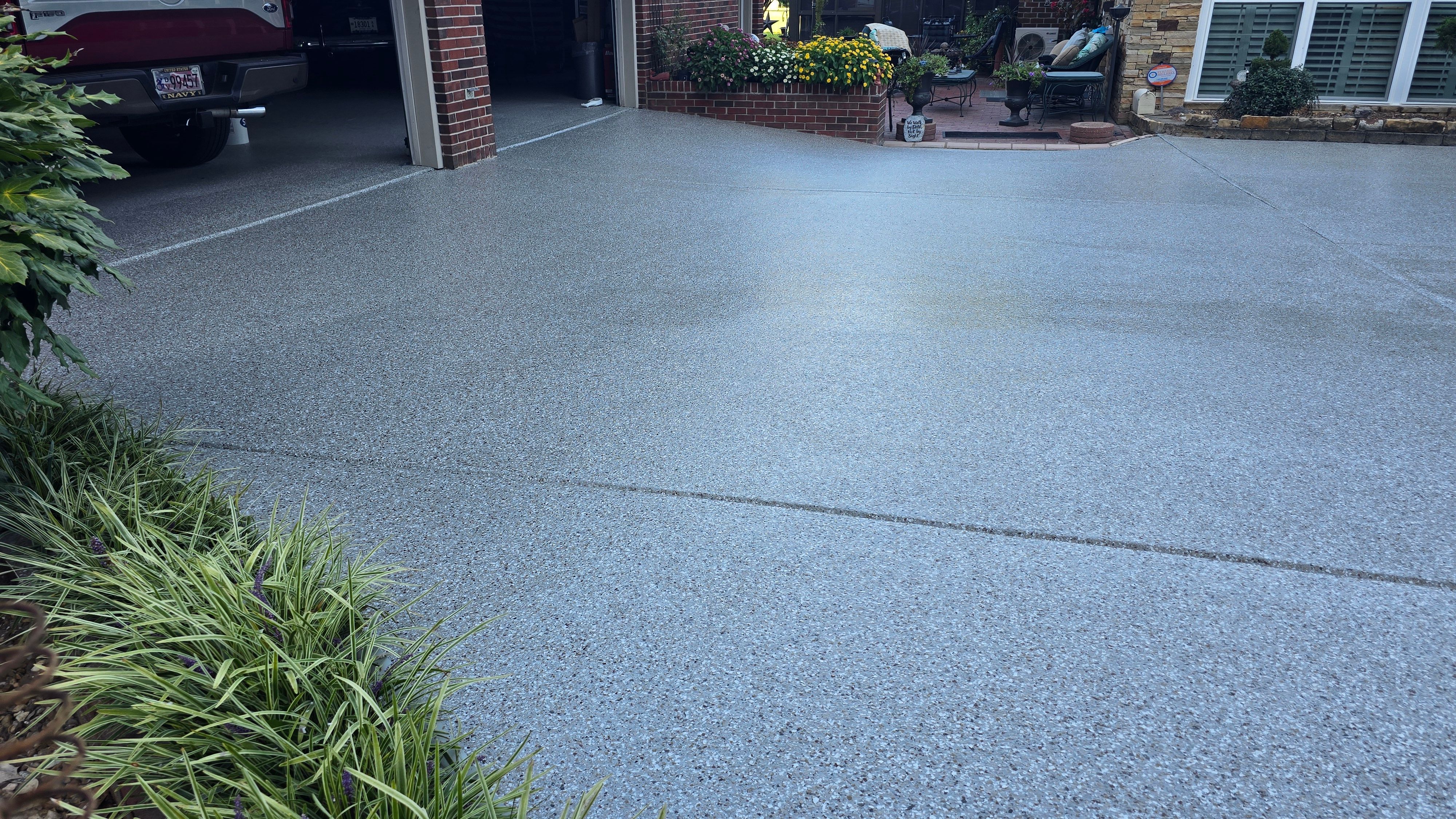 Driveway, Garage, Porch, and Sidewalk using Creekbed by Elite Floor Solutions