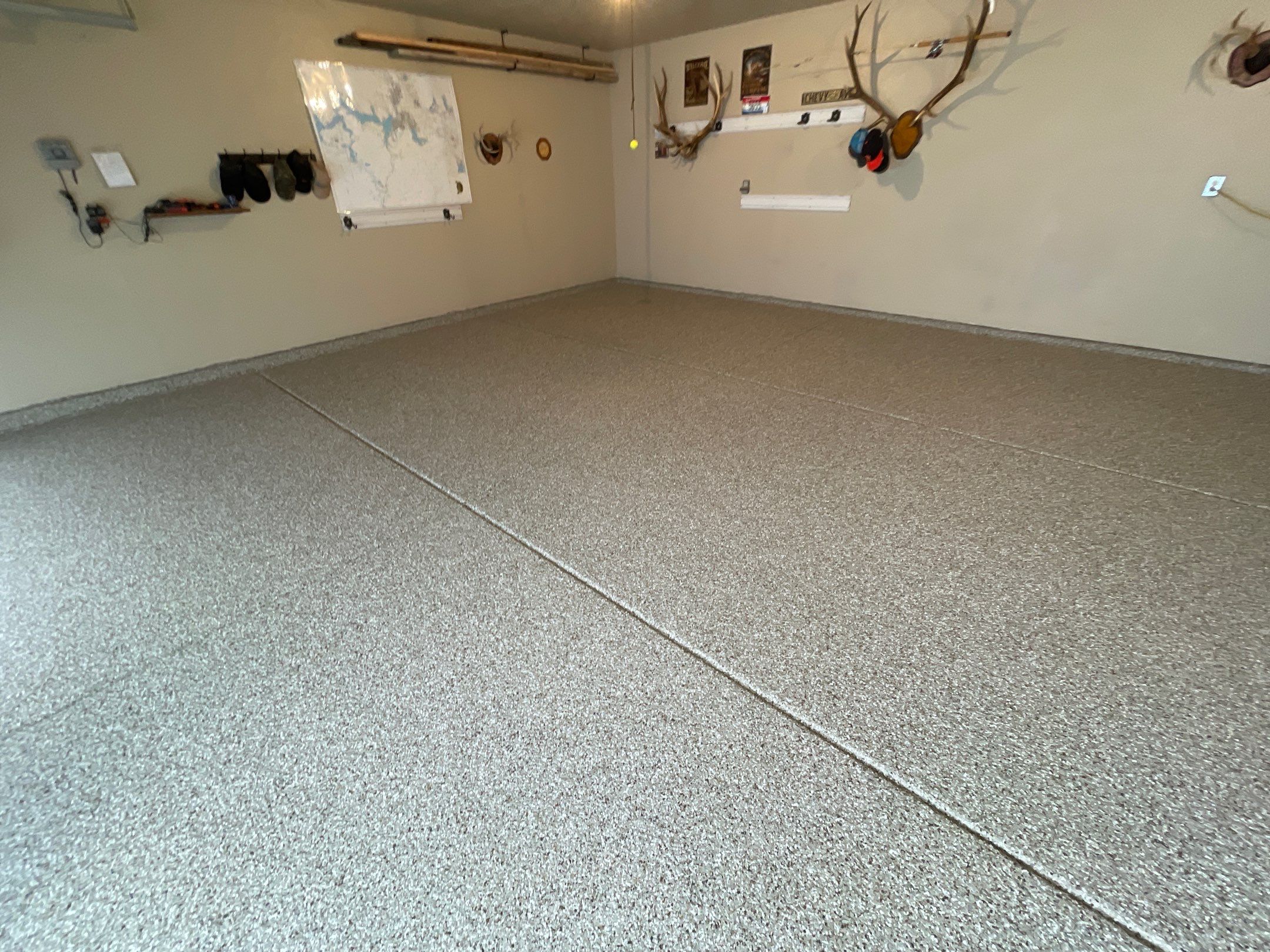 Garage Transformation using Pebble Beach and Front Porch using Greystone by Croc Coatings, LLC