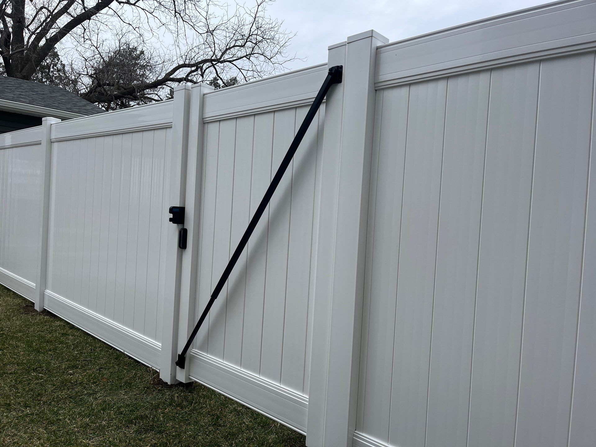 White Vinyl Privacy and Black Chain Link Fencing in Buckingham by Perfect Picket Fence and Stain