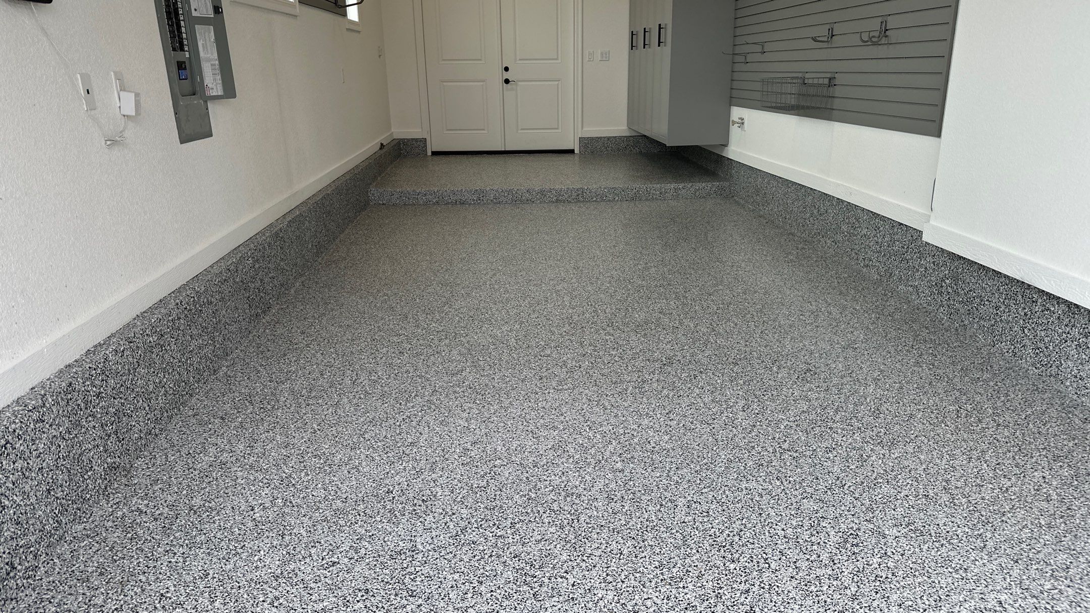 Mike & Pam transformed their garage with a Banner Garage Floor and Cabinets by Banner Garage
