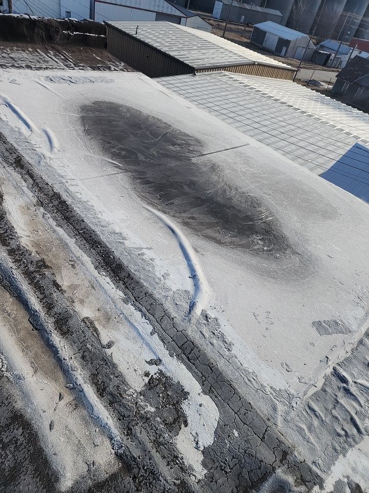Recover of a downtown building  by Grell Roofing