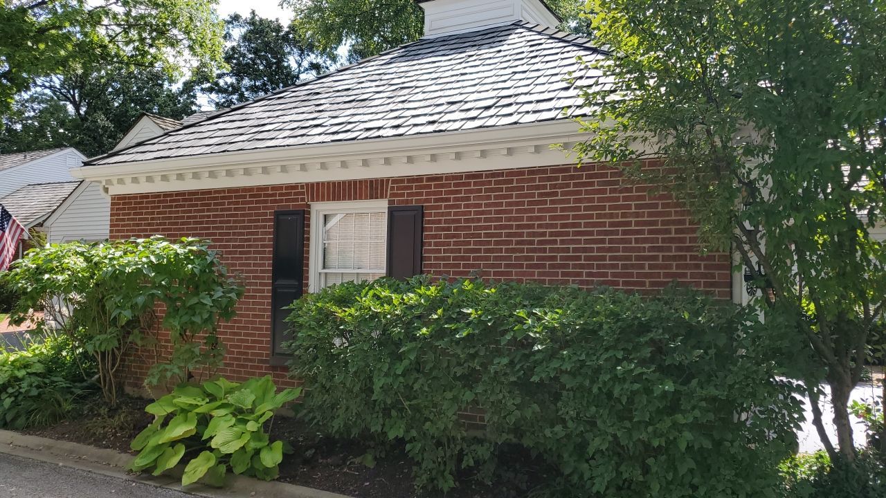 Housewashing  using Algaecide, soft wash soap by Northern Power Washing LLC.