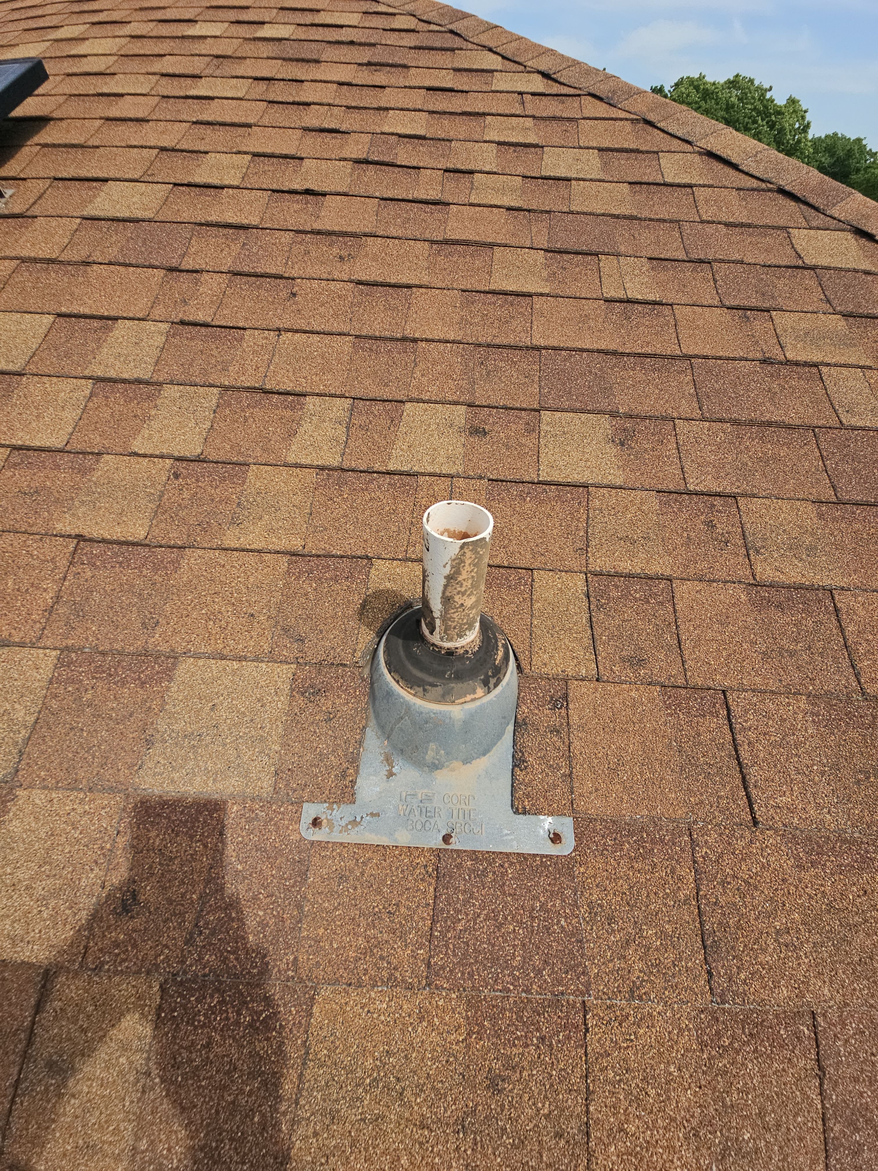 "Full Roof Replacement Due to Hail and Water Damage – Before & After" by road roofing llc