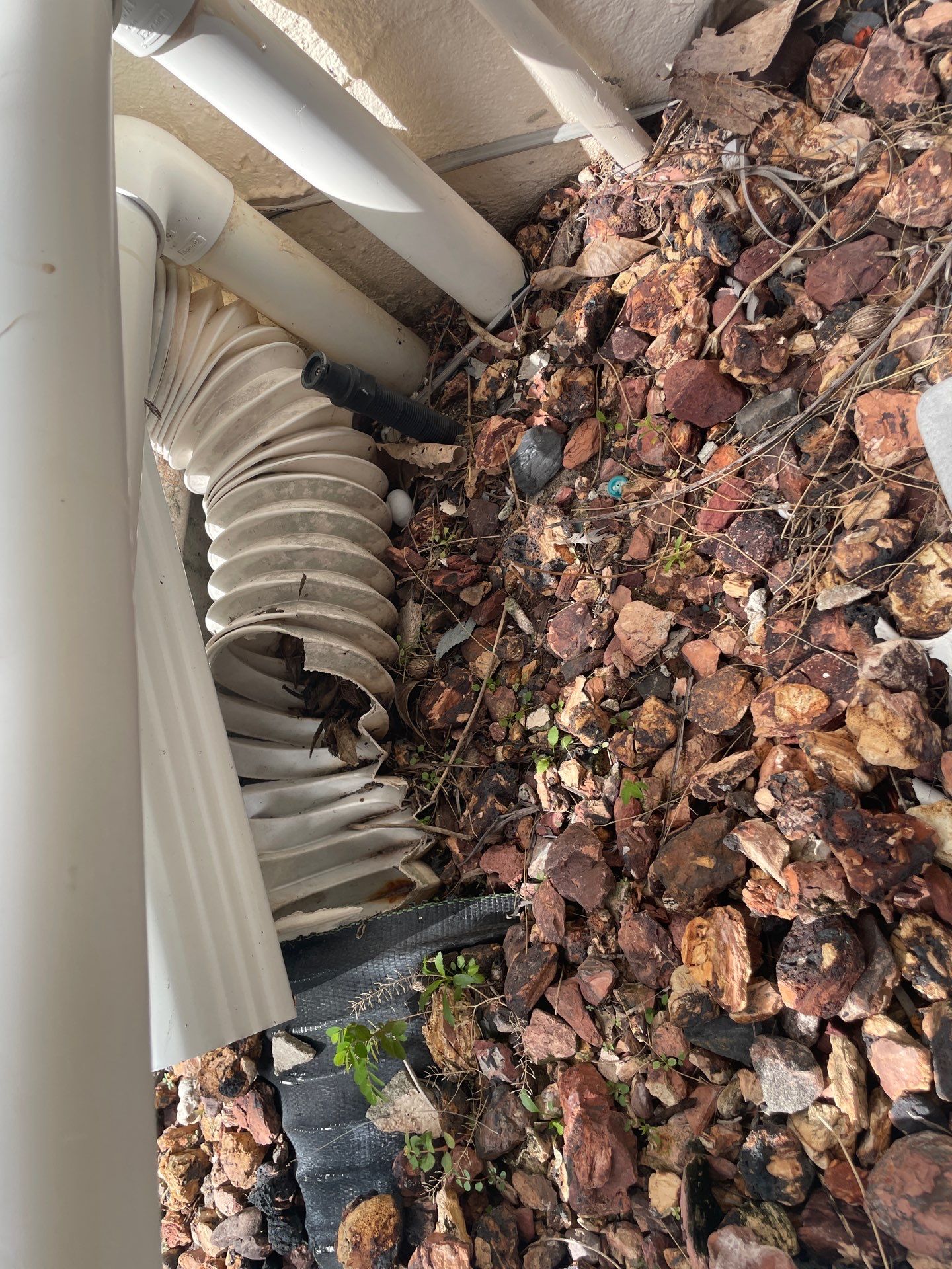 Connect Downspouts to Drain in Punta Gorda FL by Gutter Professors