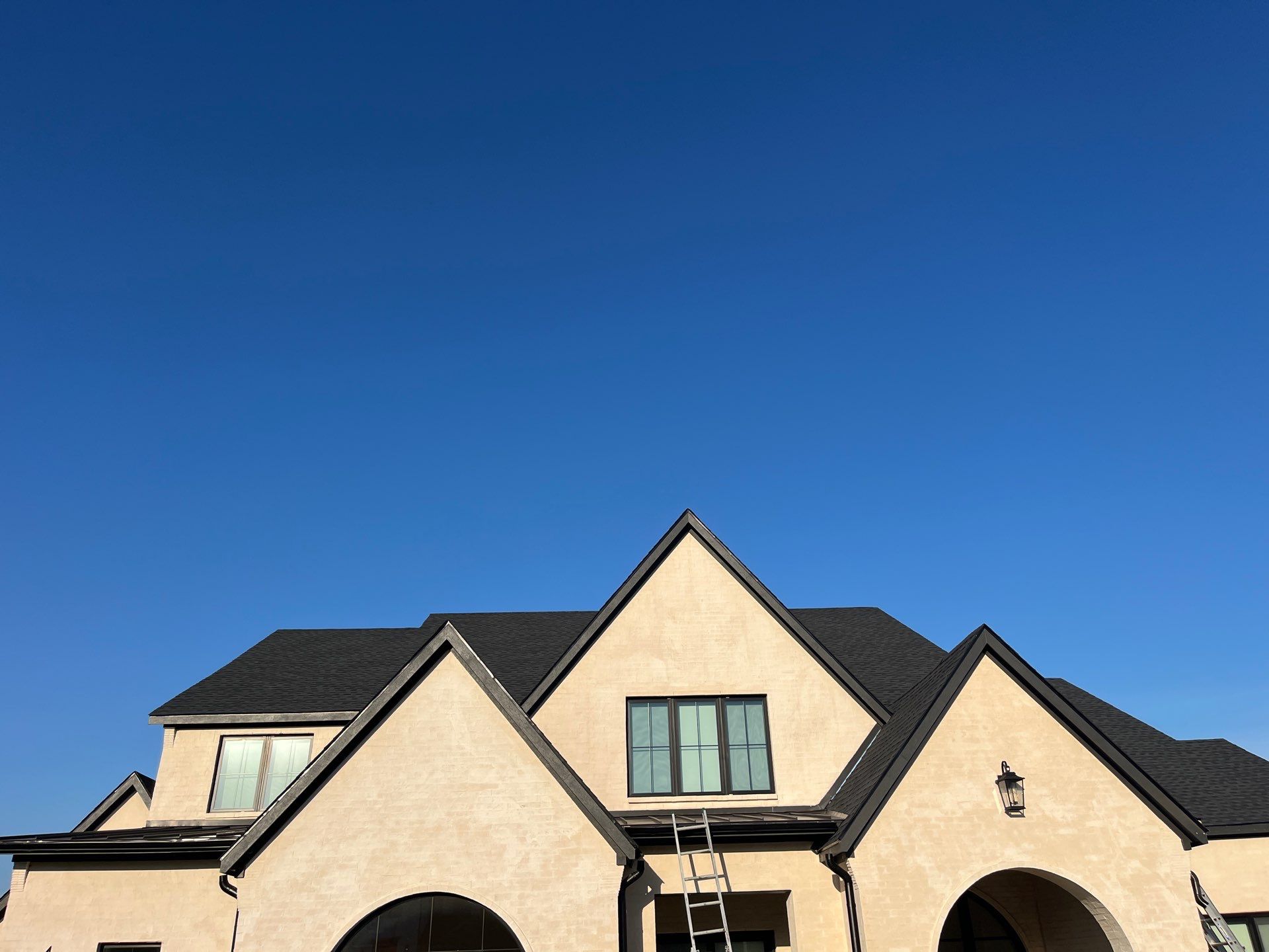 GAF-Charcoal with White Brick  by Tejas Roofworks + Restoration