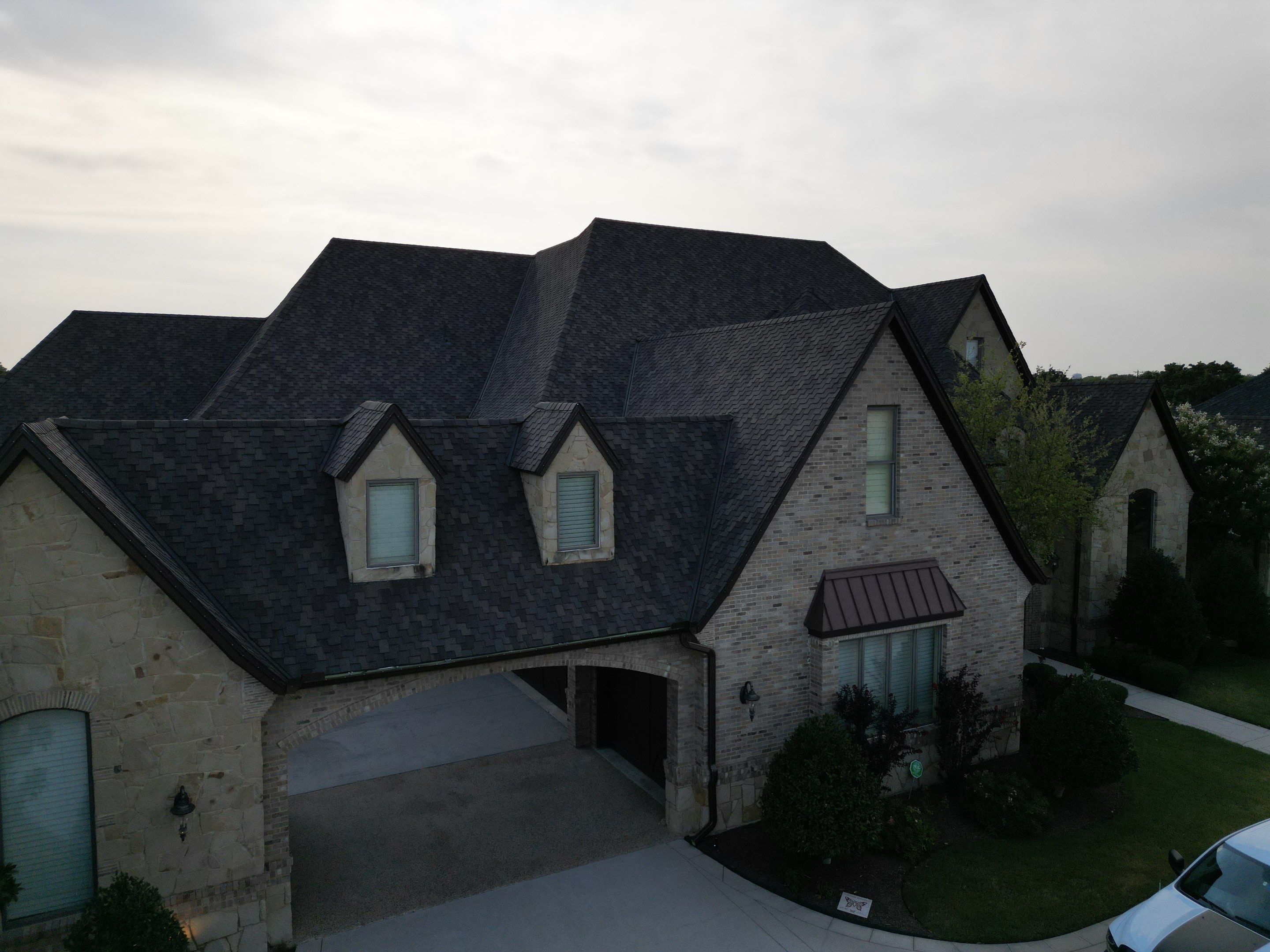 Standing Seam Metal Accent by First Out Roofing 