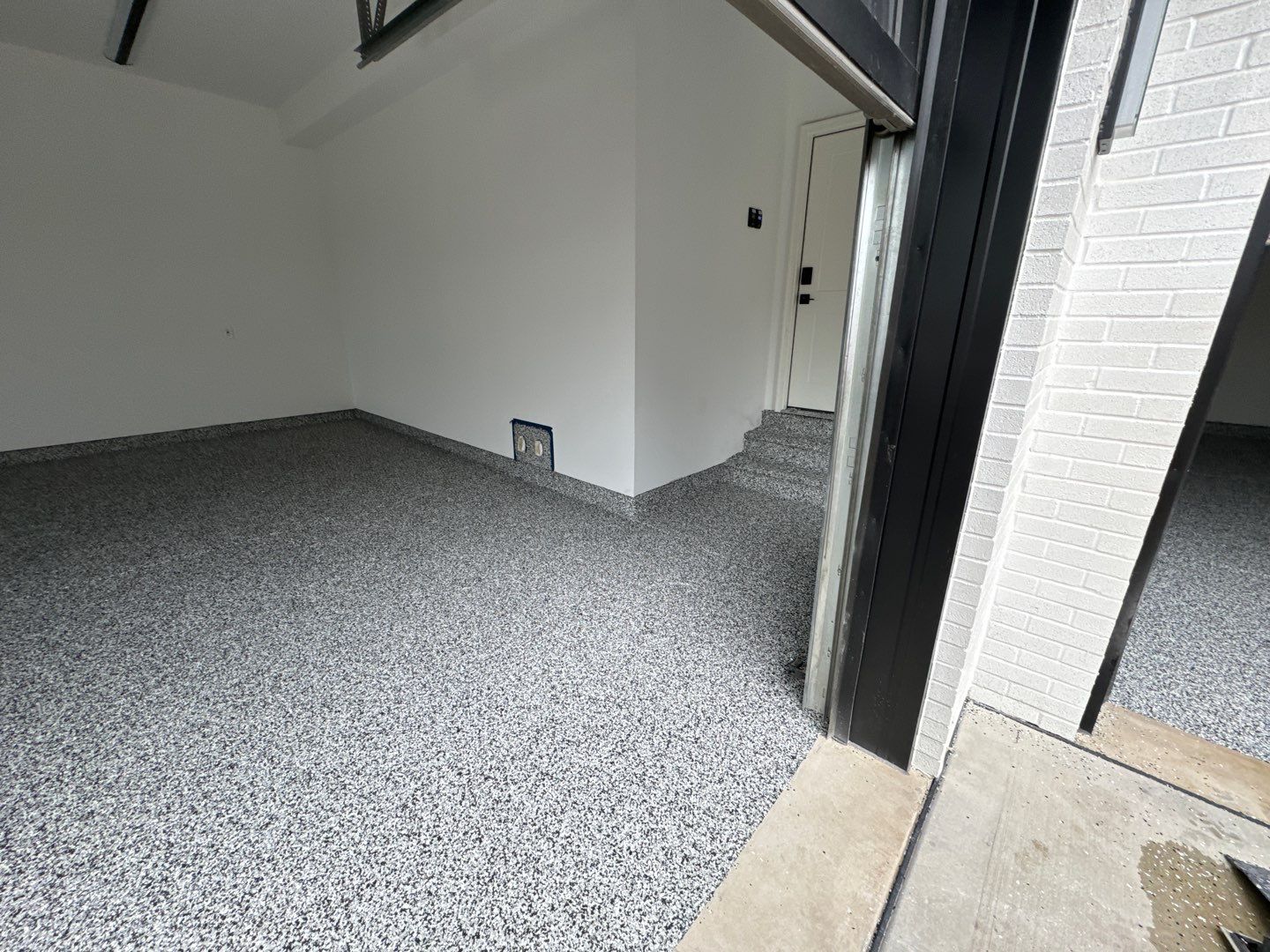 Domino Garage Floor Coating by Level 10 Coatings