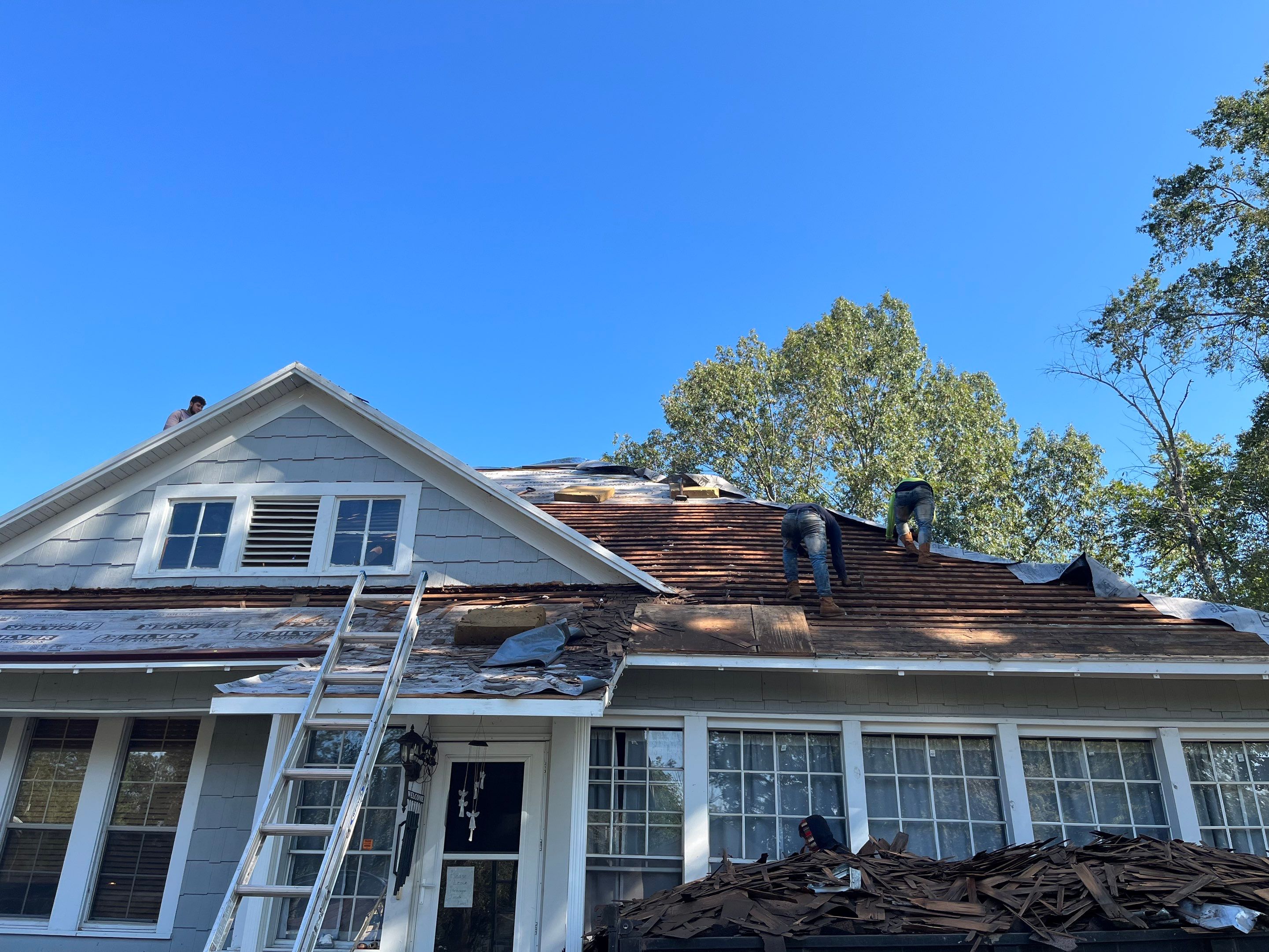 Residential Metal Roof Replacement using Reed's Metals: Colored Residental Panel (Burgundy) by Hostetler Roofing