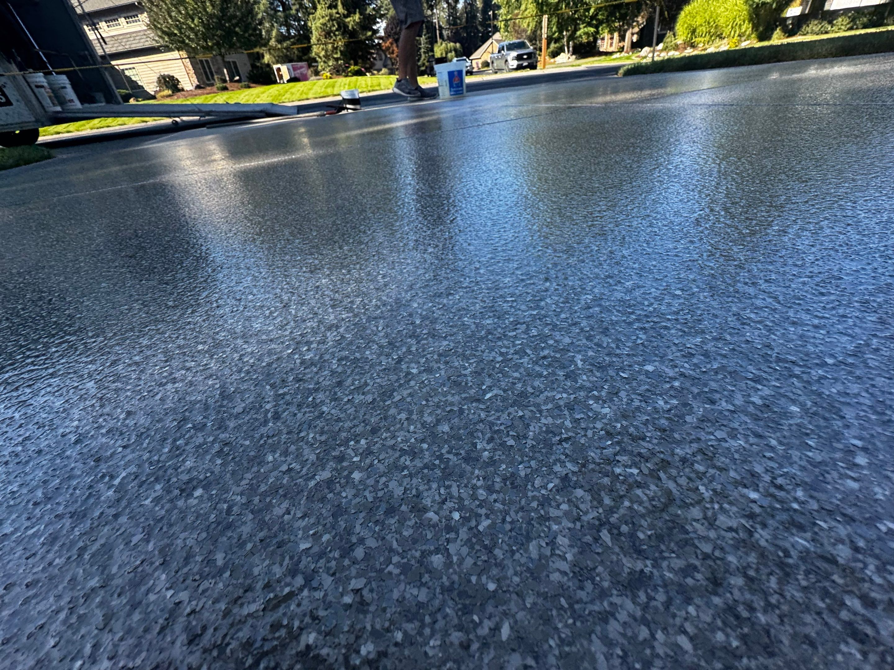 Driveway using Penntek Evolution System and Trail Mix 1/8" Chip by Croc Coatings, LLC