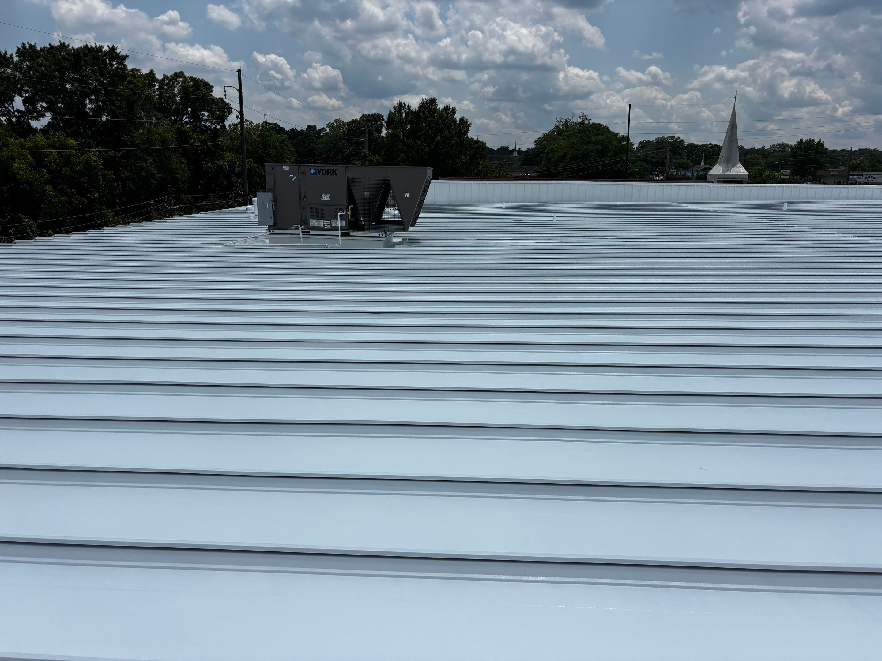 12,180 SQ Ft Commercial Metal Roof Restoration in Clarkston by Southern Roof Solutions