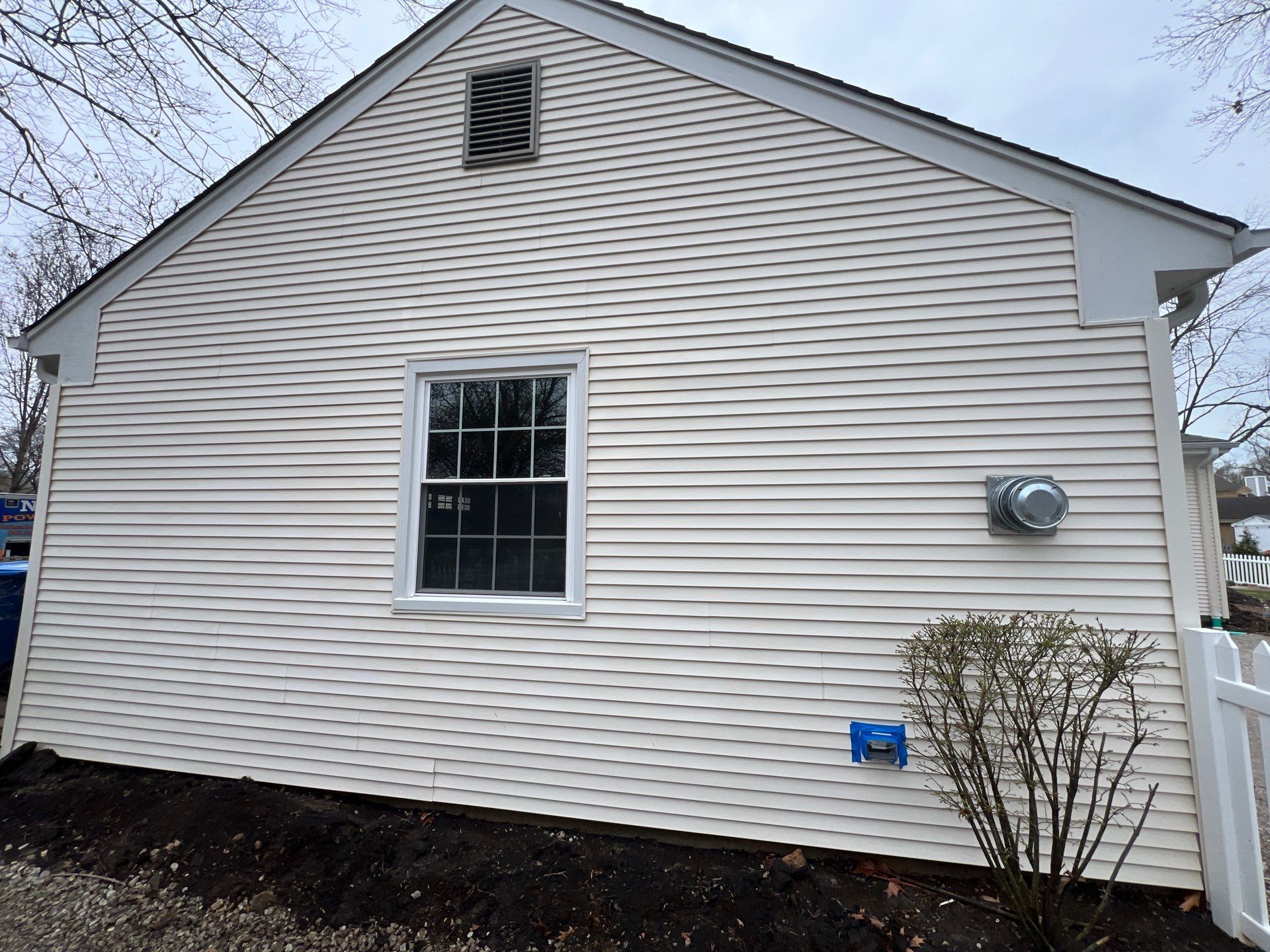 Housewashing  using Algaecide, soft wash soap by Northern Power Washing LLC.