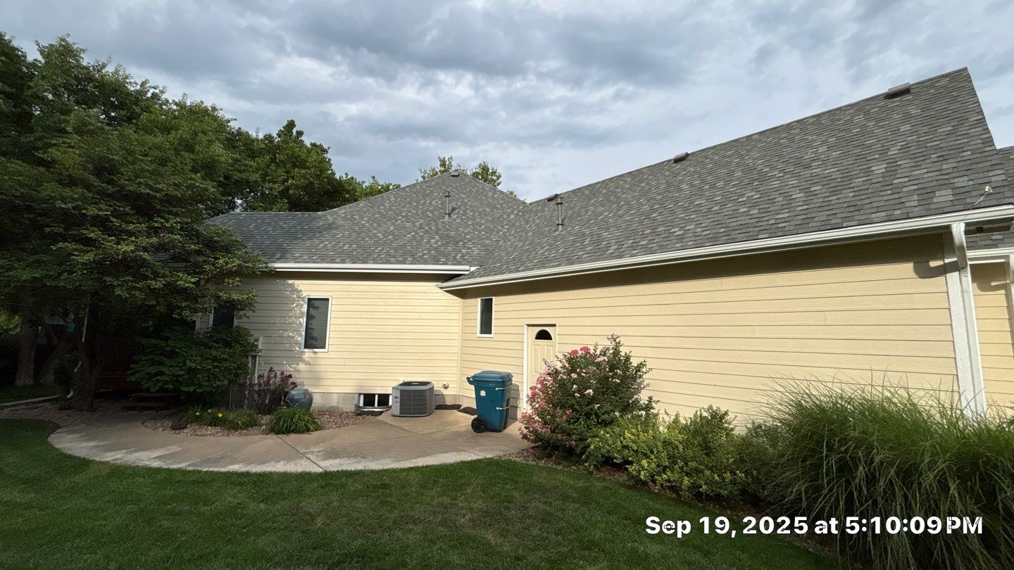 Storm Damaged Roof & Gutter Replacement by Eaton Roofing 