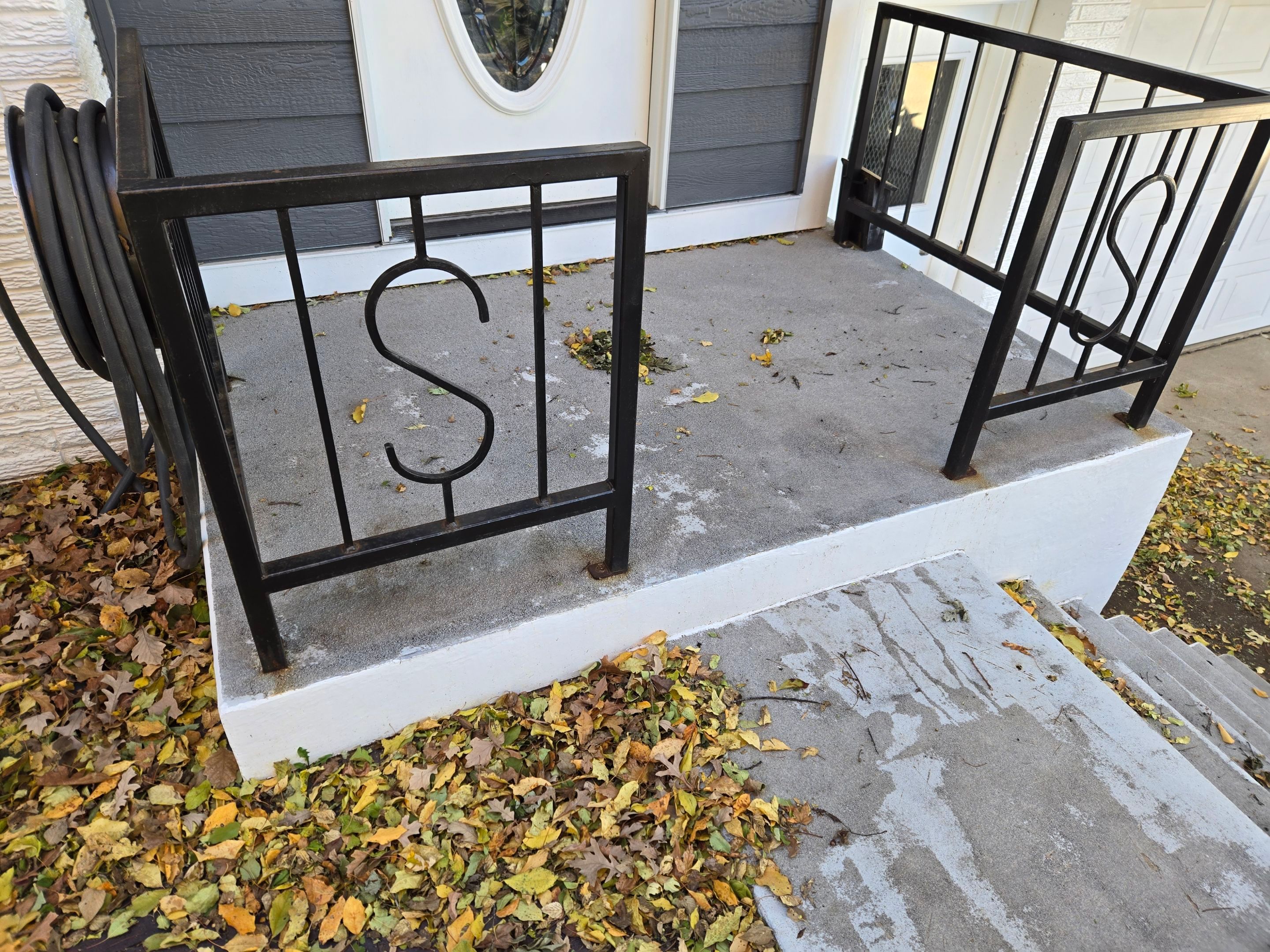 Grey Polyaspartic Porch and Stair Resurfacing in Sioux Falls by Select Painting, Coatings & Garage Cabinets