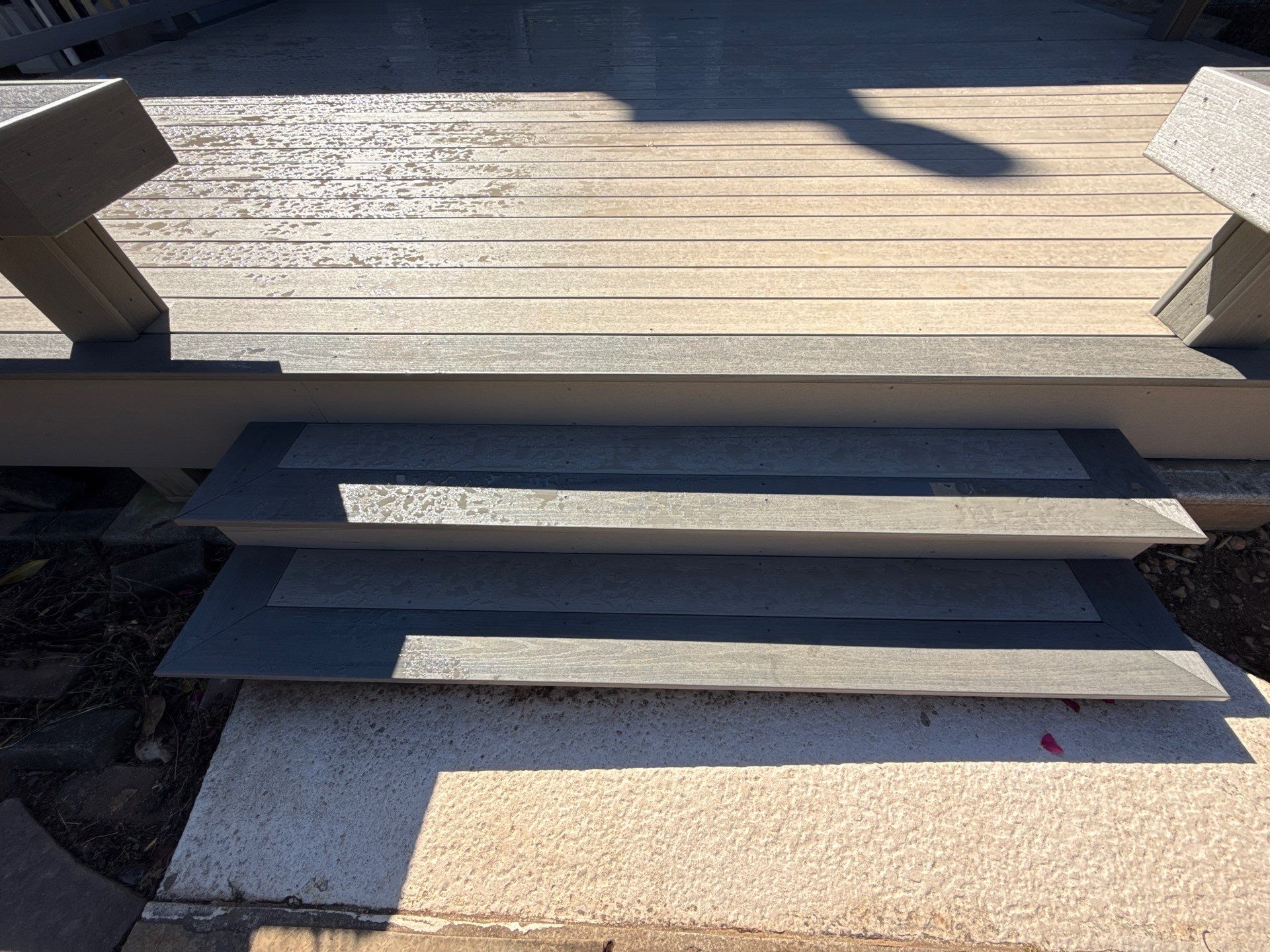 Custom Composite Deck with Integrated Seating in Roswell by Swift Home Renovations