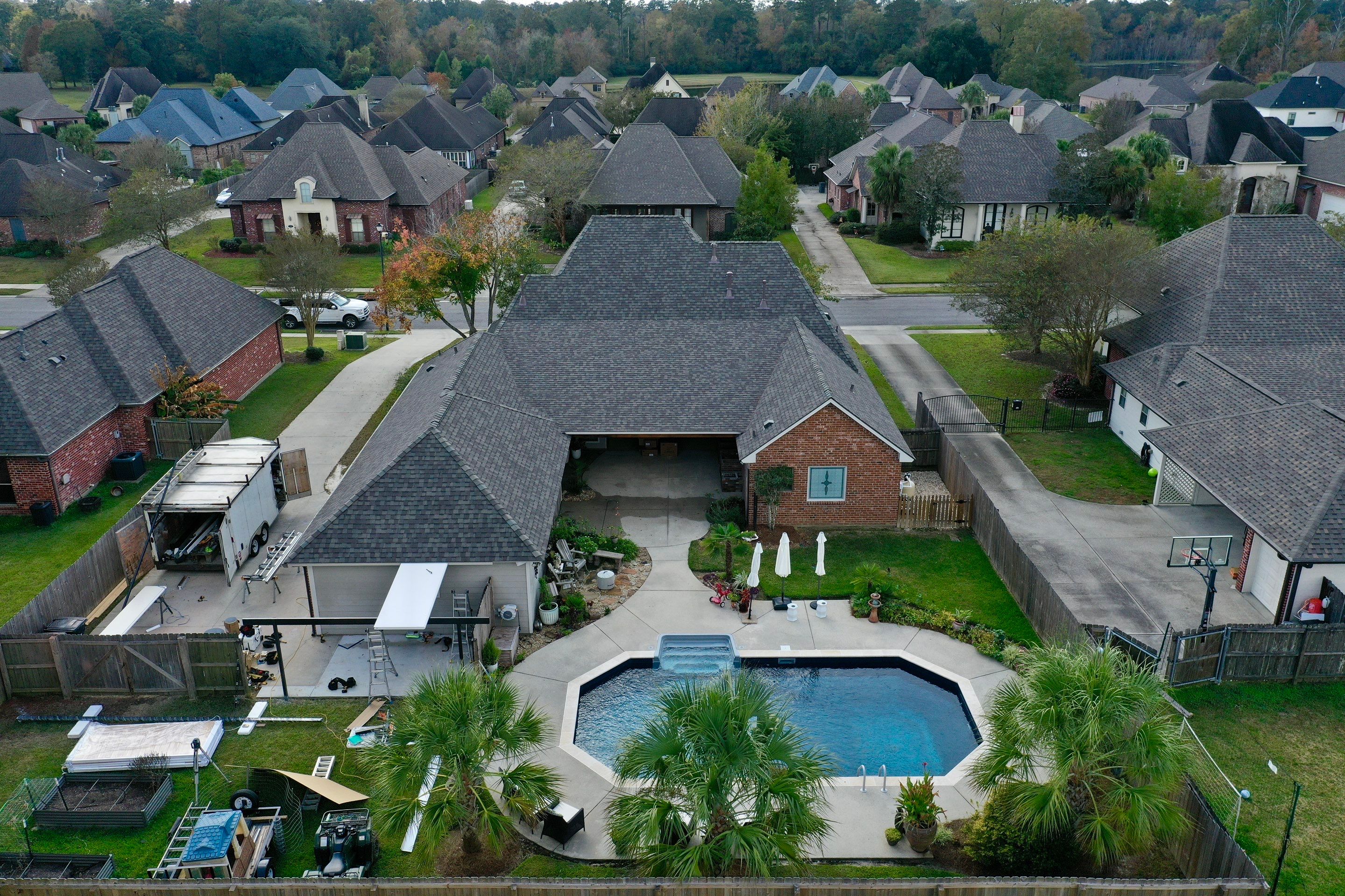 Certainteed Landmark Weathered Wood w patio extension by Top Team Roofing & Construction