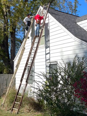 Residential Roofing Installation using Tamko Titan and aluminum siding repair