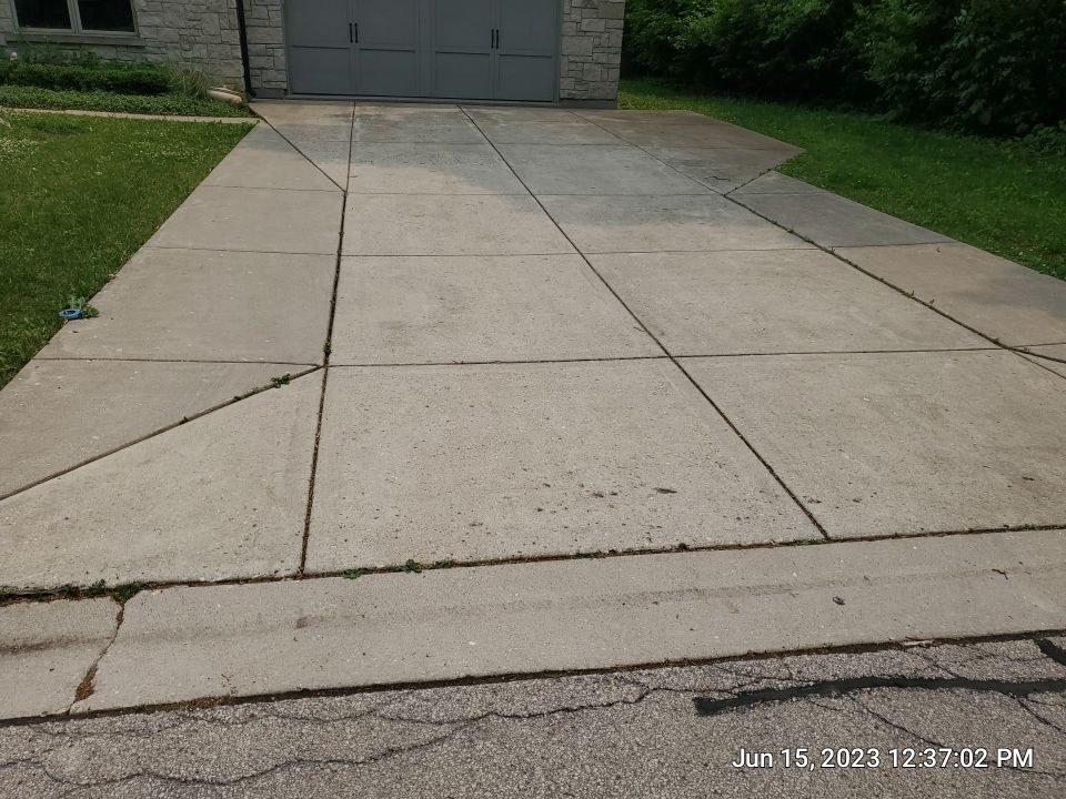 Highland Park, IL Bluestone, concrete,  Trex deck cleaning by Northern Power Washing LLC.