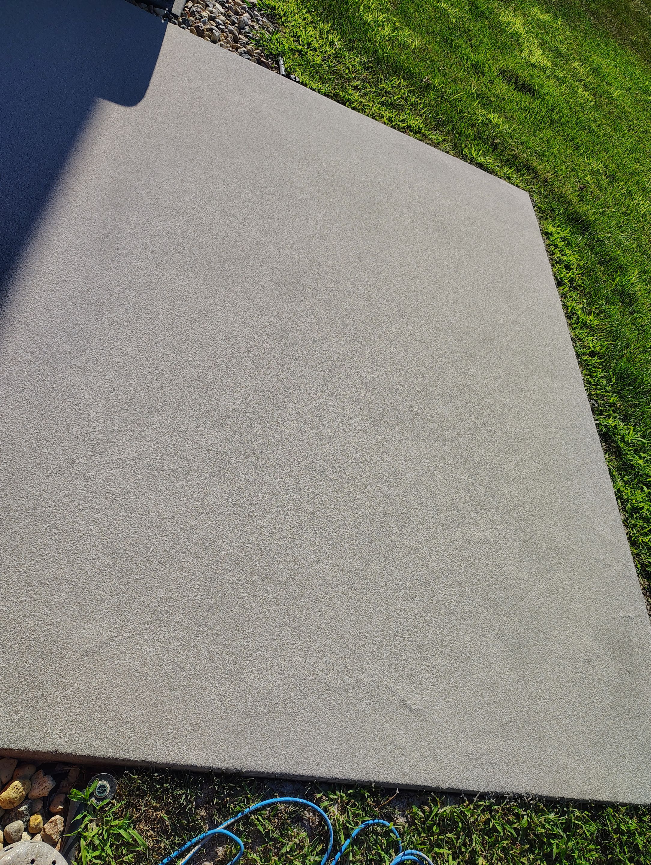Custom Epoxy Garage Floor and Patio Coating in Sioux Falls by Select Painting, Coatings & Garage Cabinets
