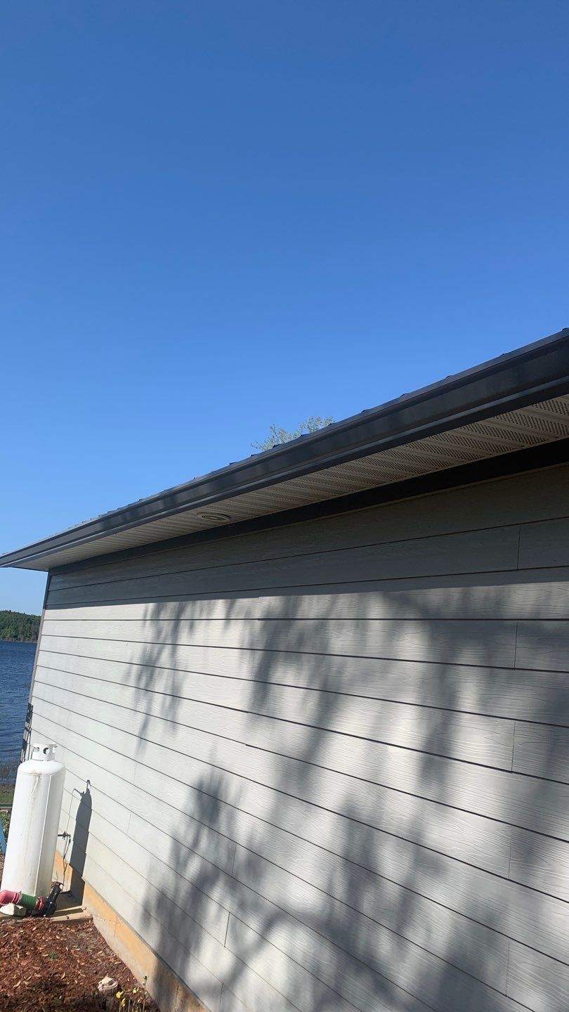Gutter Installation Using Charcoal Grey K-Style Seamless Aluminum Gutters by Gutter Professors