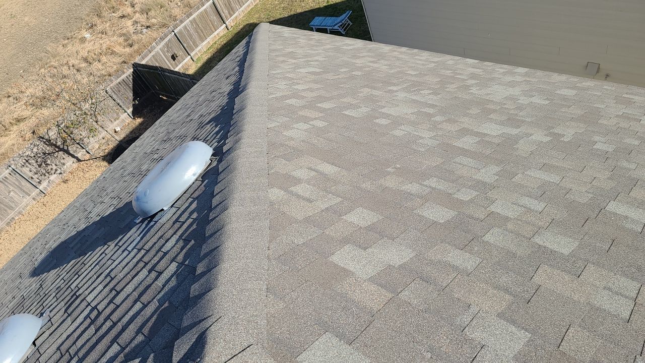 Austin Residential Roofing Replacement with Architectural Shingles and Flashing by Caliber Restoration LLC