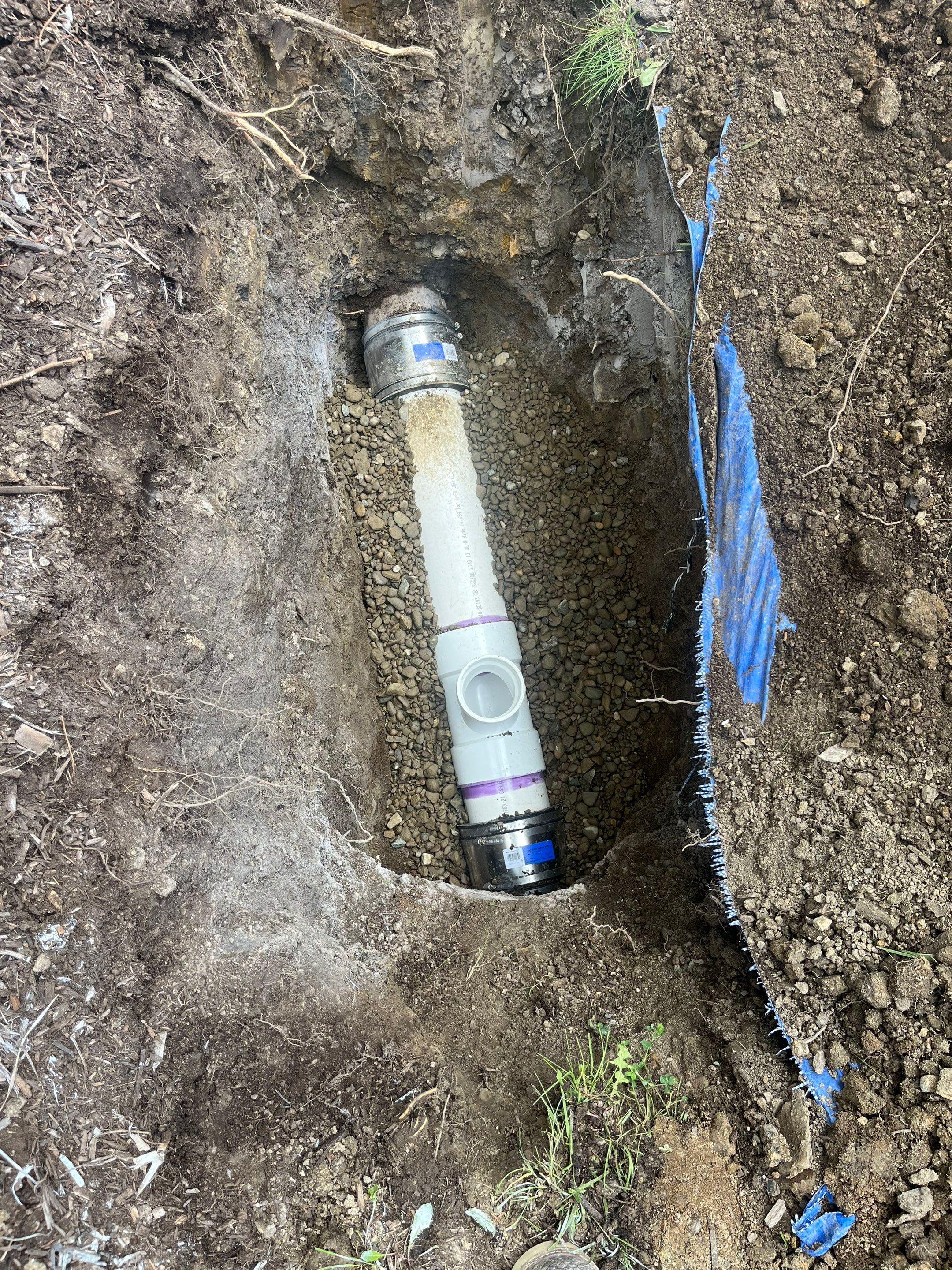 Adding Cleanout after House Trap using 2 Ton Excavator by Sureway Comfort John Wilcox Plumbing Heating Cooling