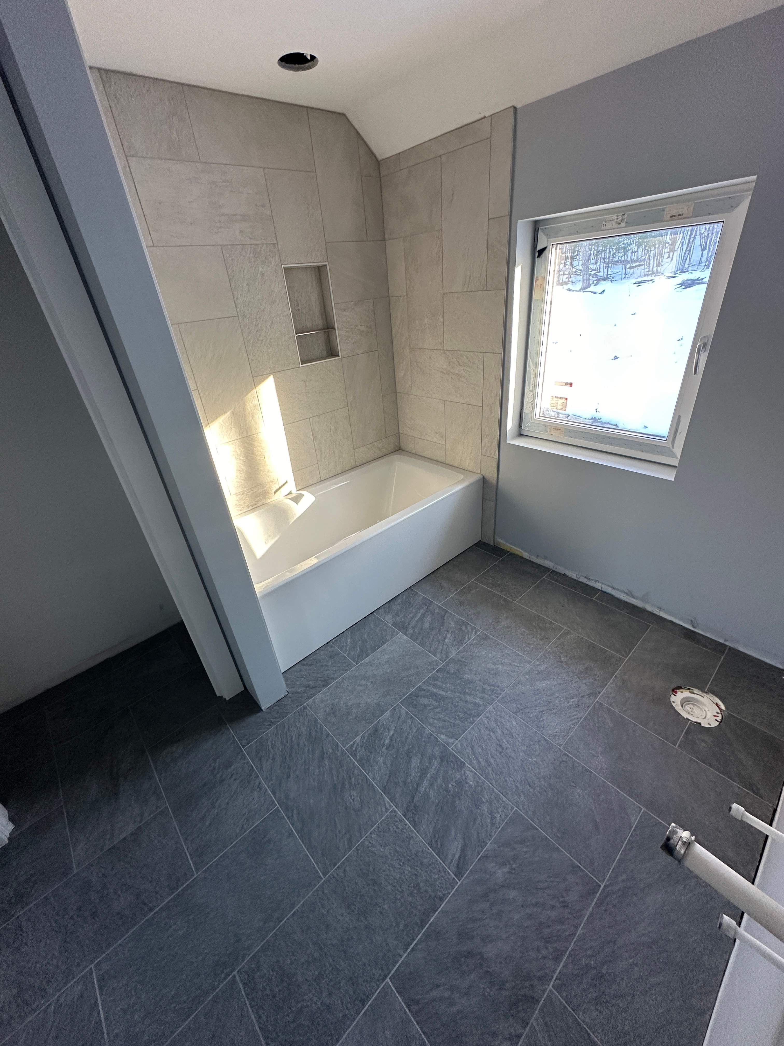 New Construction Tile by Renovatic LLC