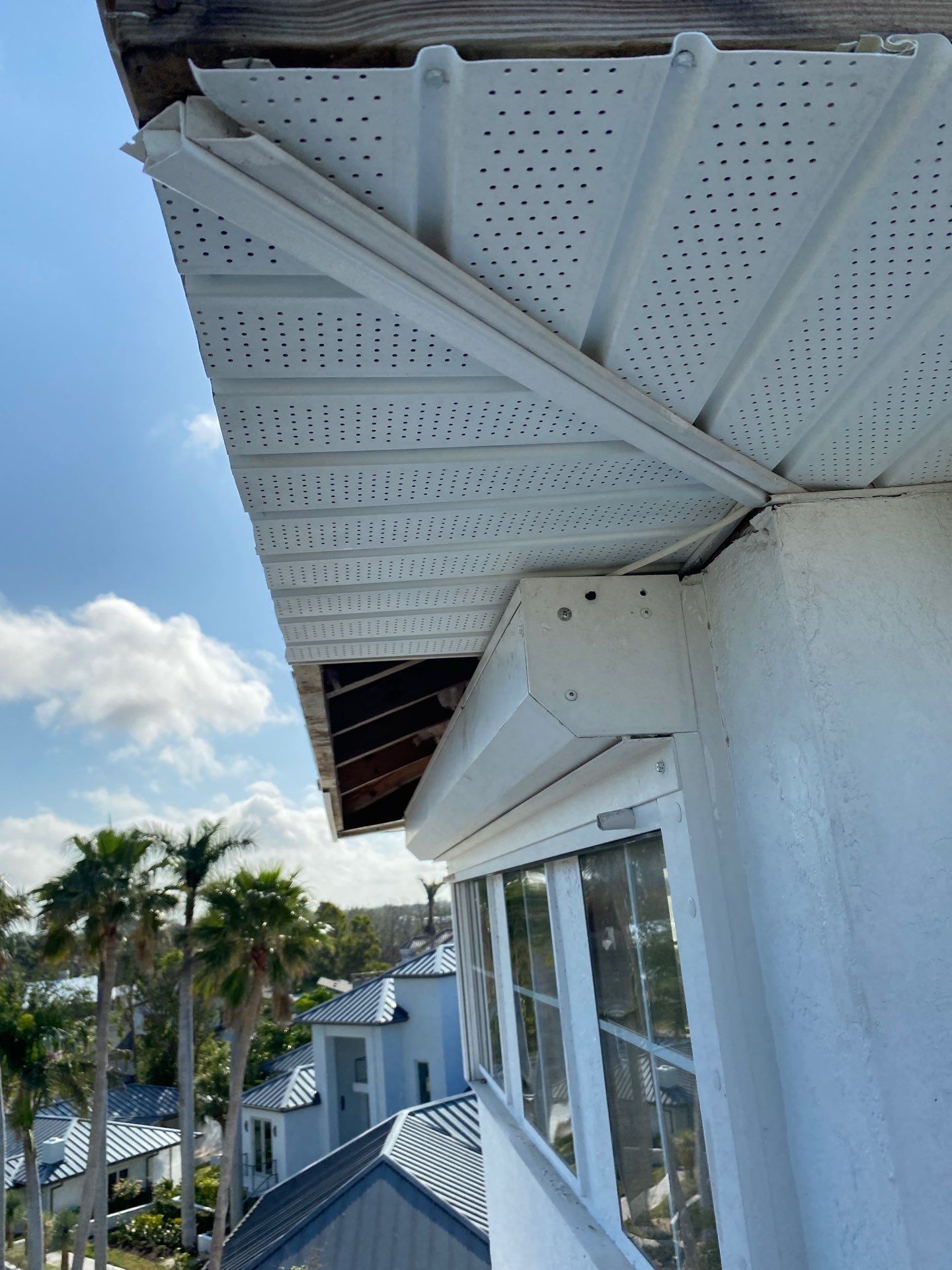 Seamless Gutter Installation for Beach Homes in Sarasota FL by Gutter Professors