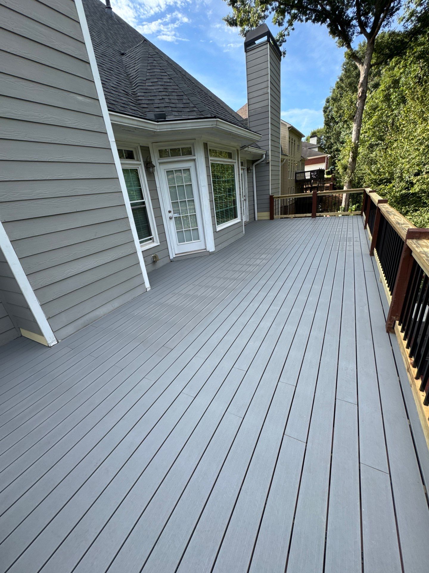 Multi-Level Composite Deck and Staircase Installation in Stonecrest by Swift Home Renovations