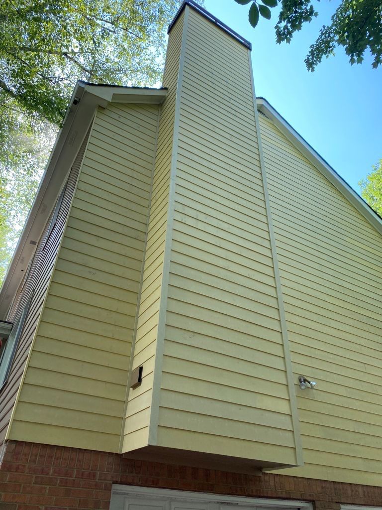 Siding Replacement and Exterior Trim Painting in Marietta, Georgia by Swift Home Renovations