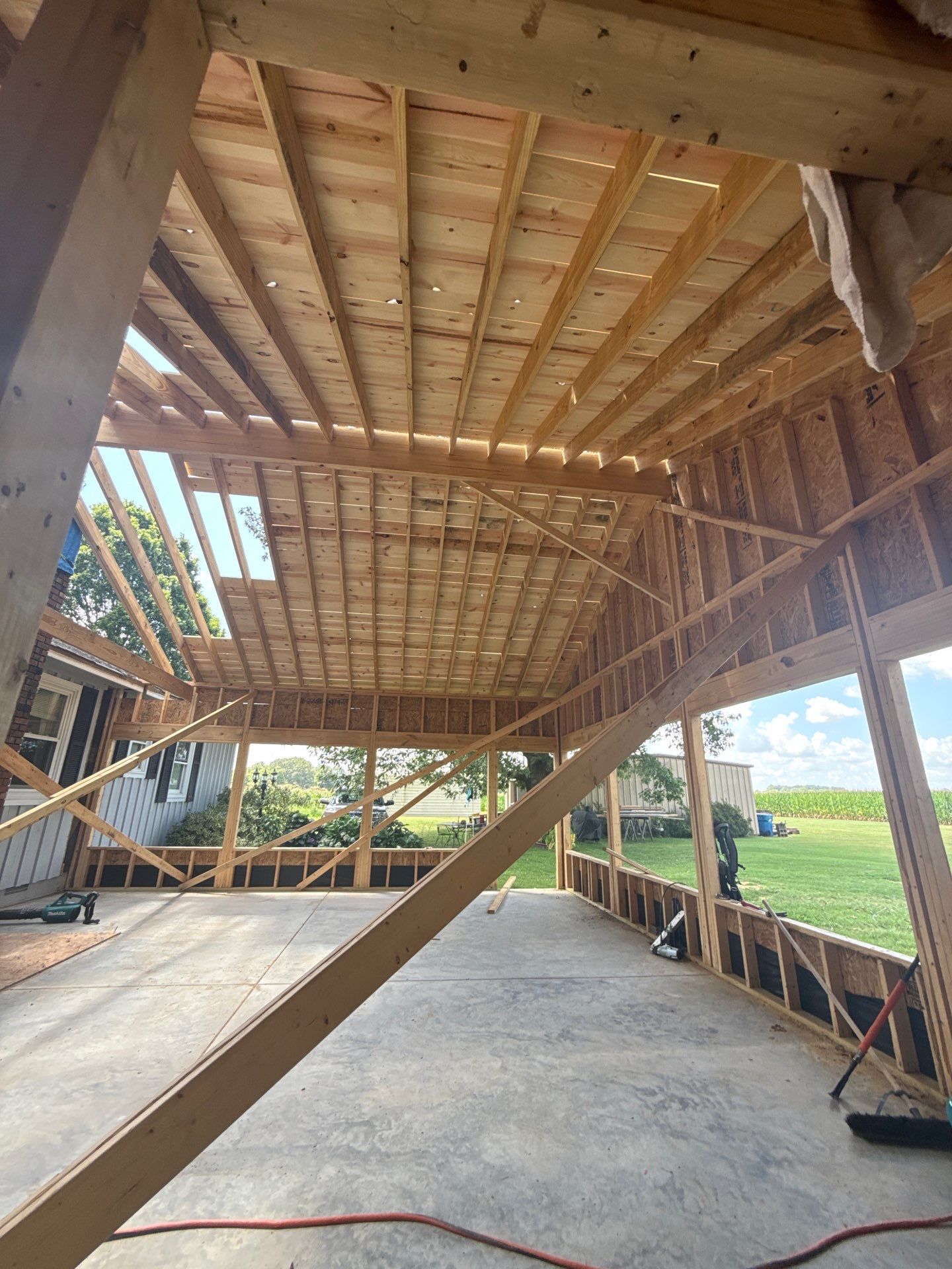 Sunroom and Garage Addition by Skilled Construction LLC