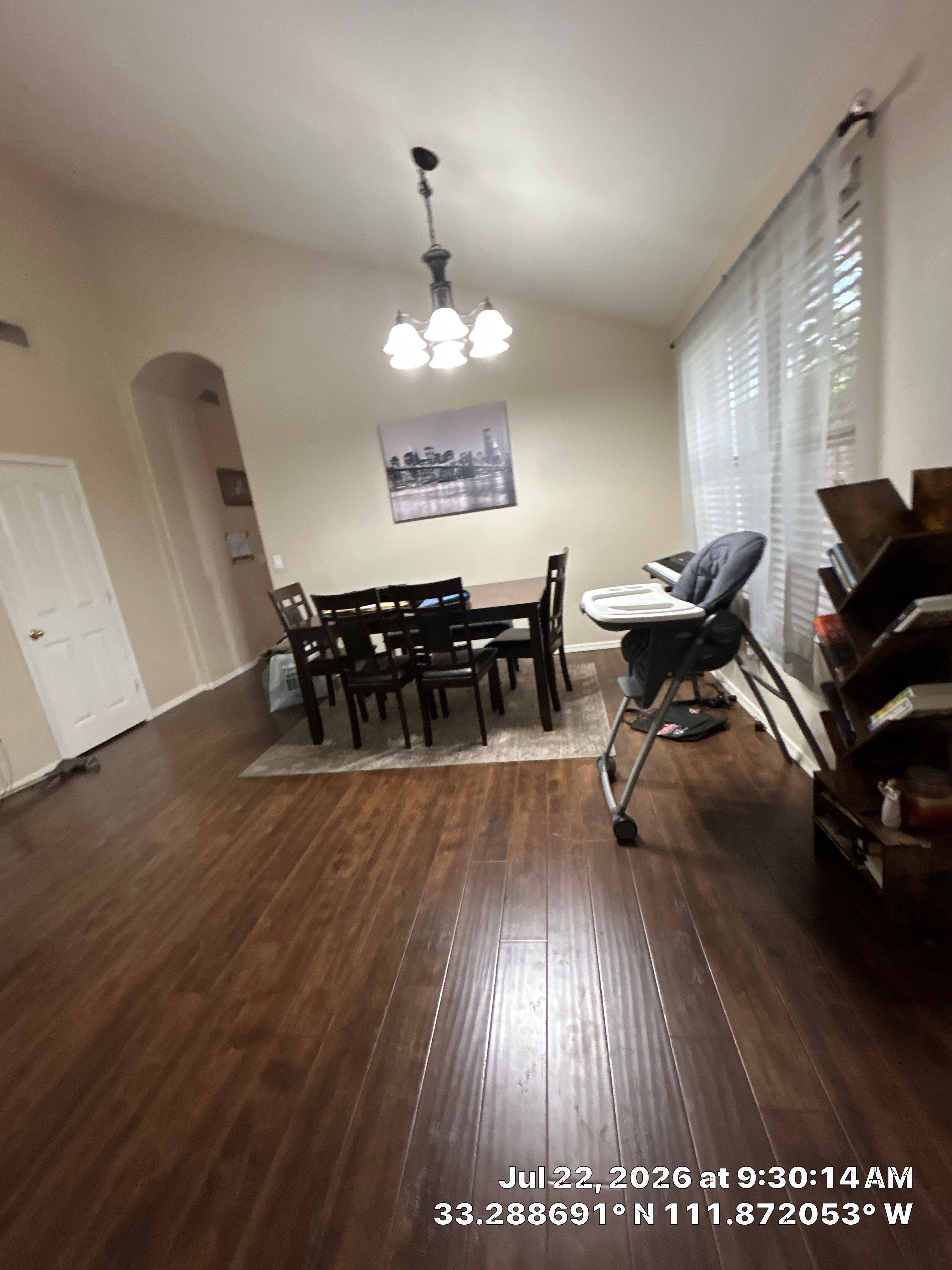 Dark Wood Floor Installation for Chandler Dining Room Renovation by CompanyCam Sales Demo