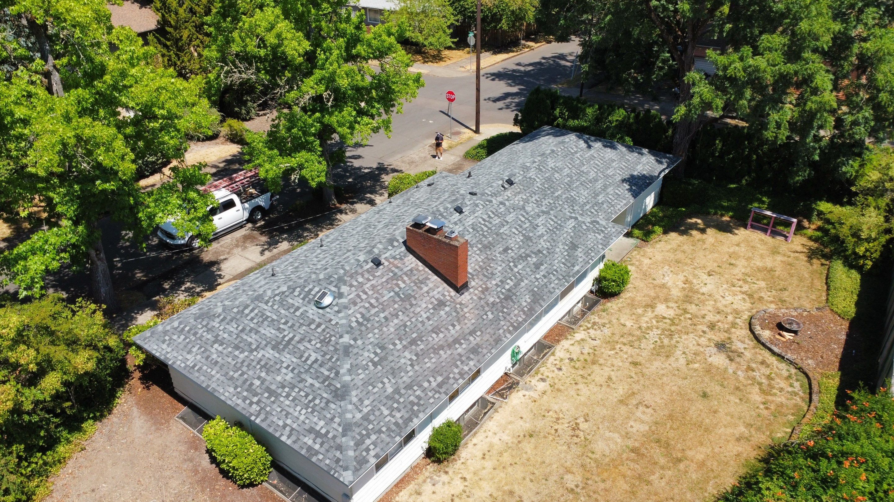 Residential Roofing Installation using IKO Dynasty (Color: Summit Grey) by Orezona Building & Roofing Company, Inc.