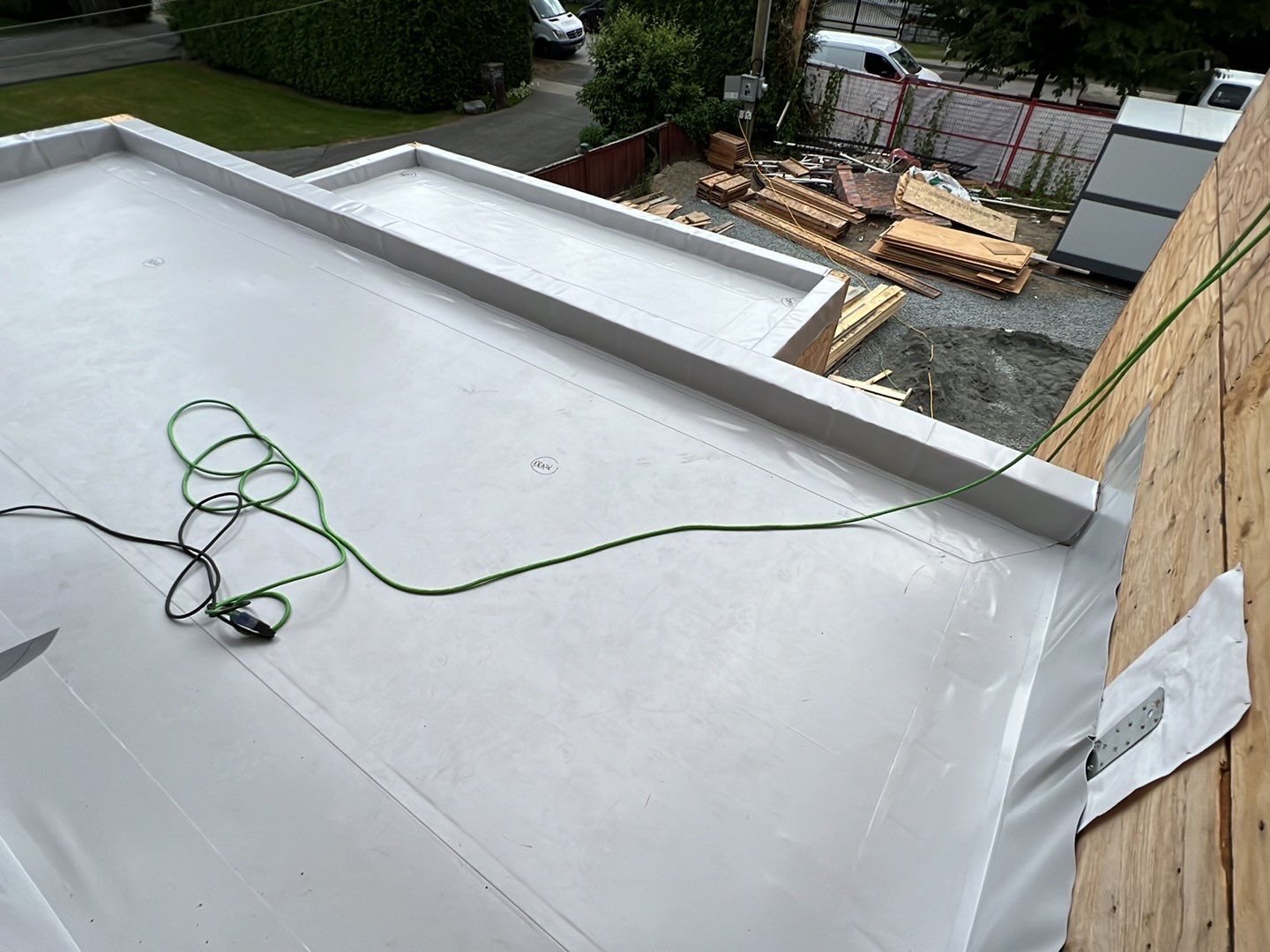 Residential Roofing Installation using Durolast roofing membrane by Top Notch Roofing Inc