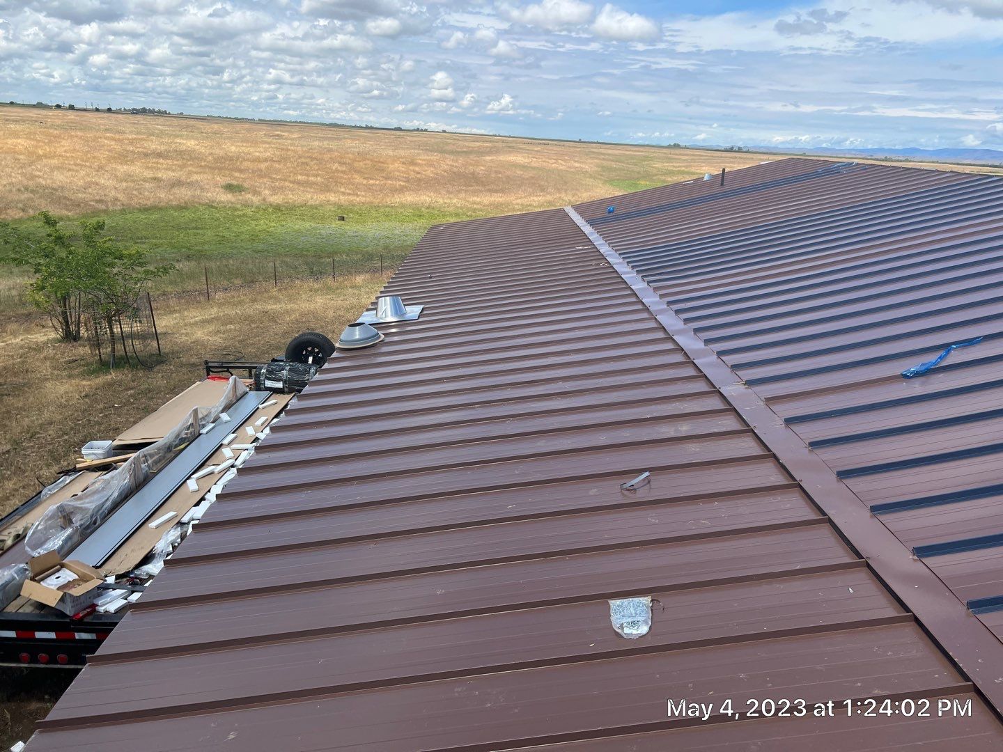 Metal roofing installation using Standing seam metal roofing system by Straight Edge Roofing Inc