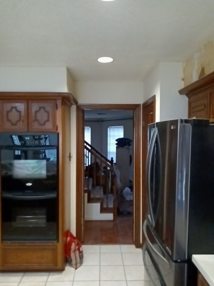Interior and exterior painting project by Roof Concepts Construction