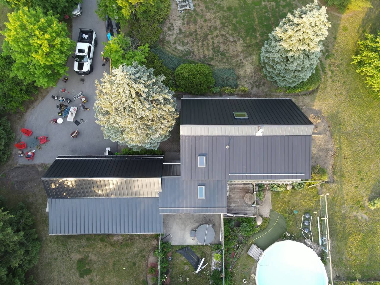 Residential Roofing Installation using 24 Ga Standing Seam Metal  by Jay Carter Roofing & Sheet Metal