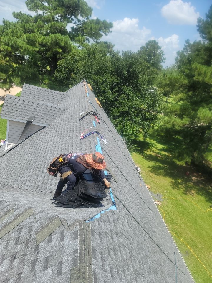 Residential Roofing Installation using Roof Replacement by American Roofing & Construction LLC