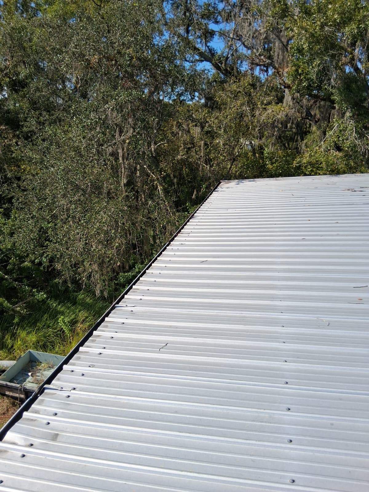 Clean Gutters and Seal Seams in Lakeland FL by Gutter Professors