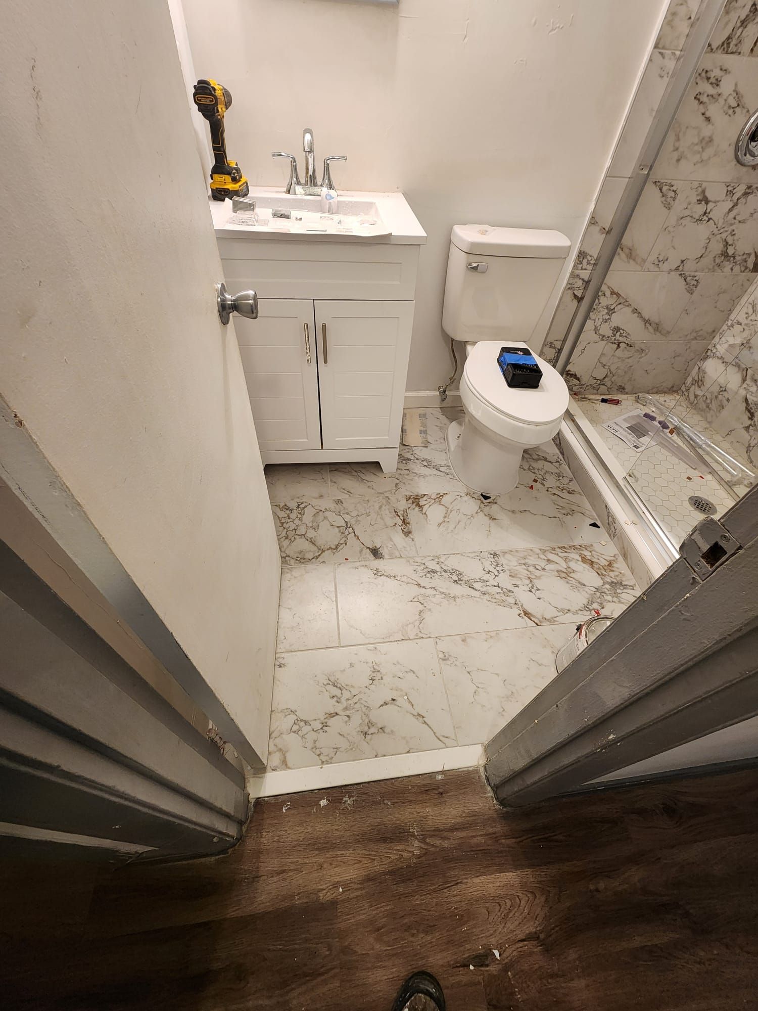 Dual Bathroom Makeover by urban green energy llc